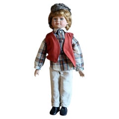 20th-Century Porcelain Boy Doll with Plaid Shirt, Red Vest and Cap - 2C245