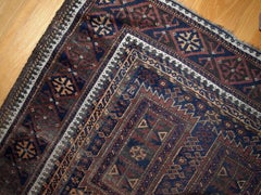Handmade Antique Distressed Afghan Baluch Oriental Rug, 1900s, 1C227