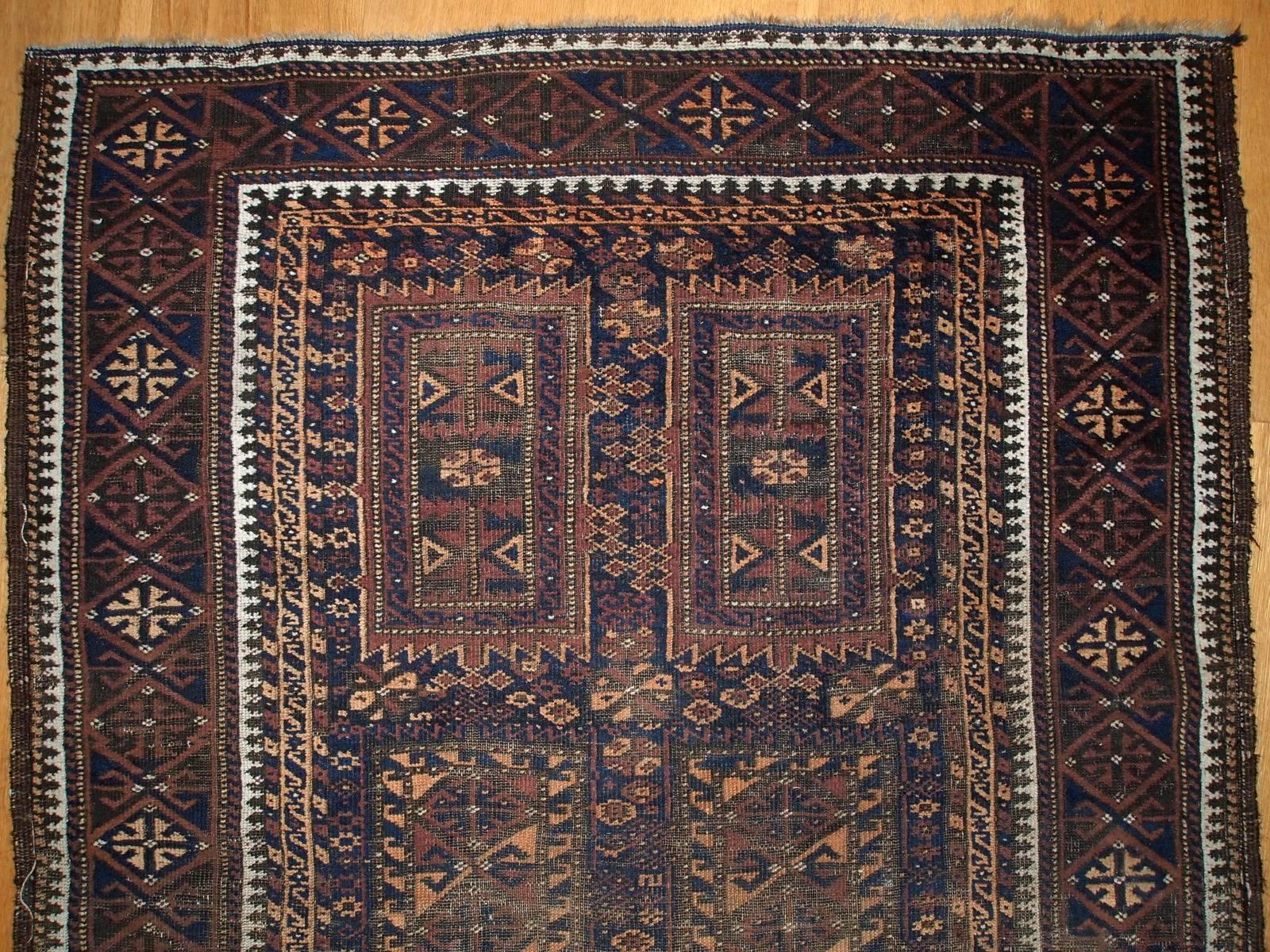 Wool Handmade Antique Distressed Afghan Baluch Oriental Rug, 1900s, 1C227 For Sale