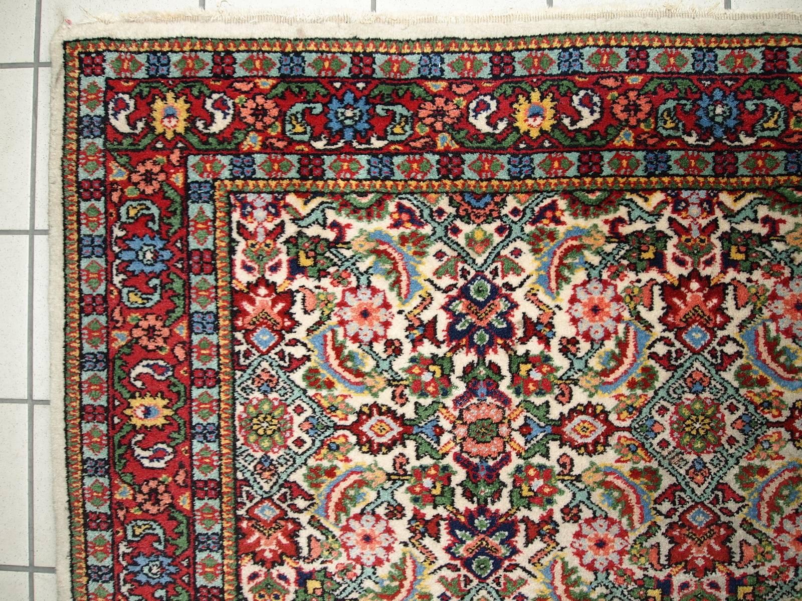 Antique Indo-Mahal rug in original condition. The name of this rug is Indo-Mahal because author reproduced Persian type of ruf Mahal in India. Design is Persian, but the rug was made in India. Beige background color with beautiful fish design mixed