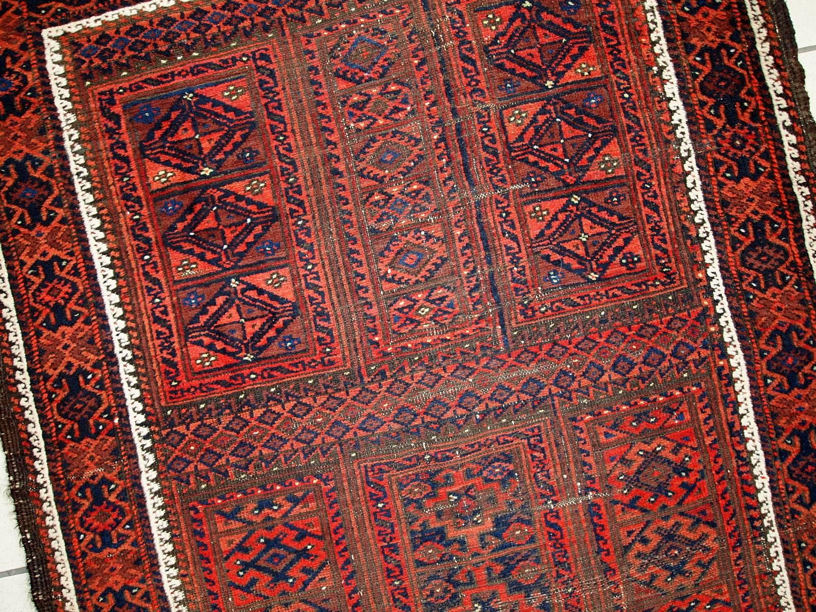 Hand-Knotted Handmade Antique Afghan Baluch Rug, 1900s