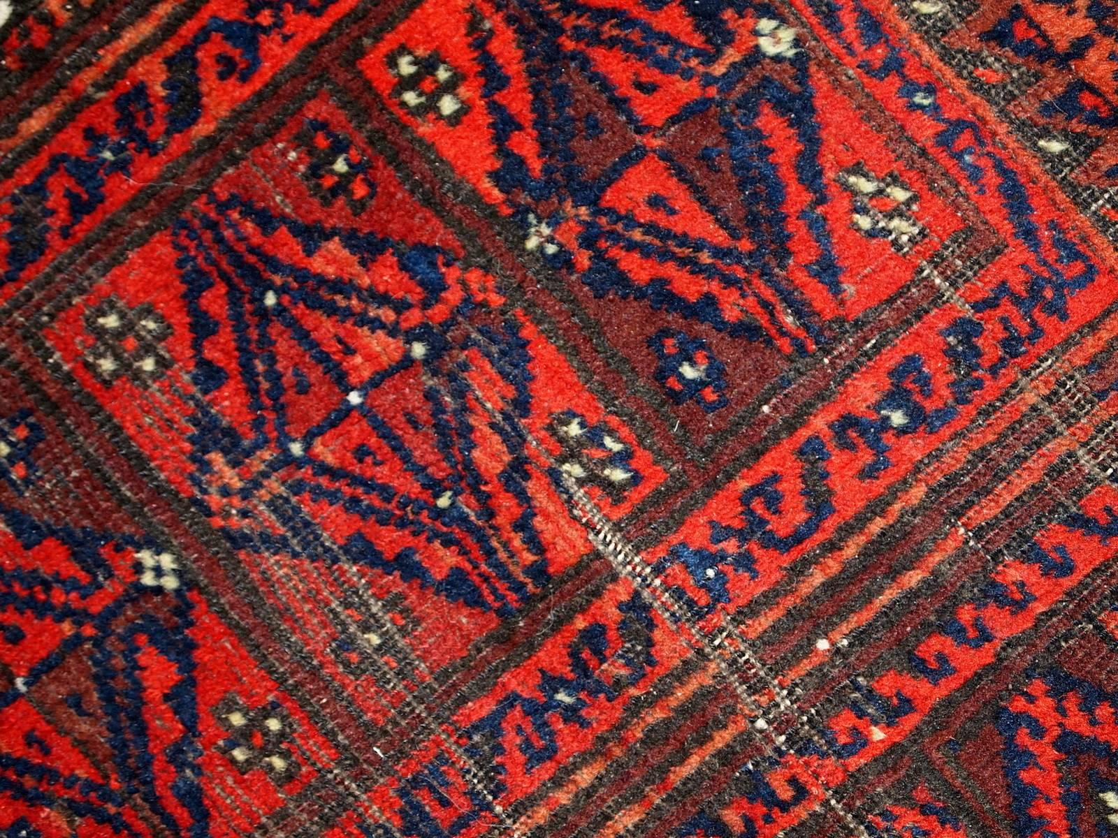 Handmade Antique Afghan Baluch Rug, 1900s 4