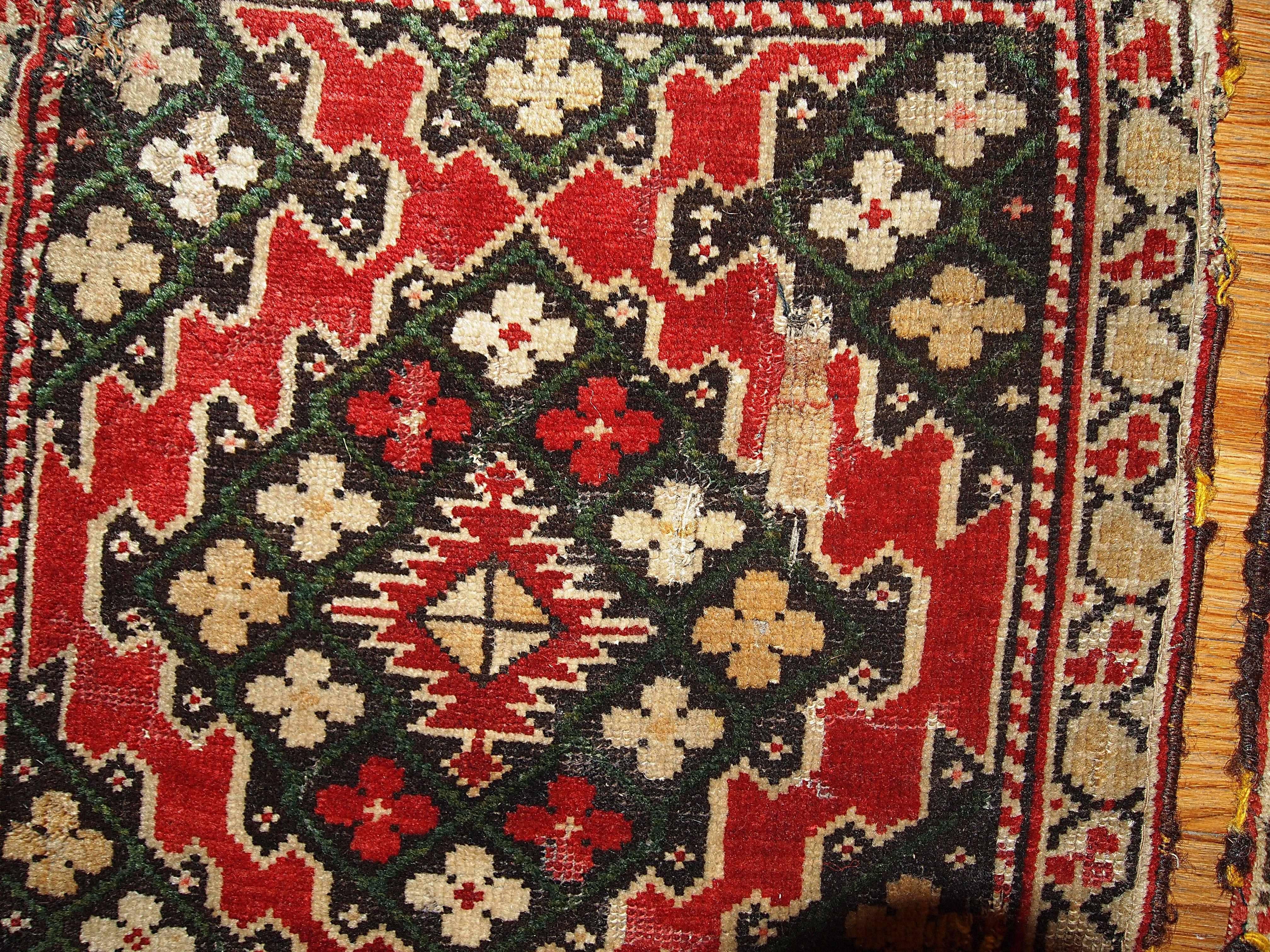 This beautiful pair of Armenian Karabakhs proudly taking its space in our antique collection. These rugs are in bright red color of field and beige borders. The color of the geometric design of the rugs are not completely match able: on one of them