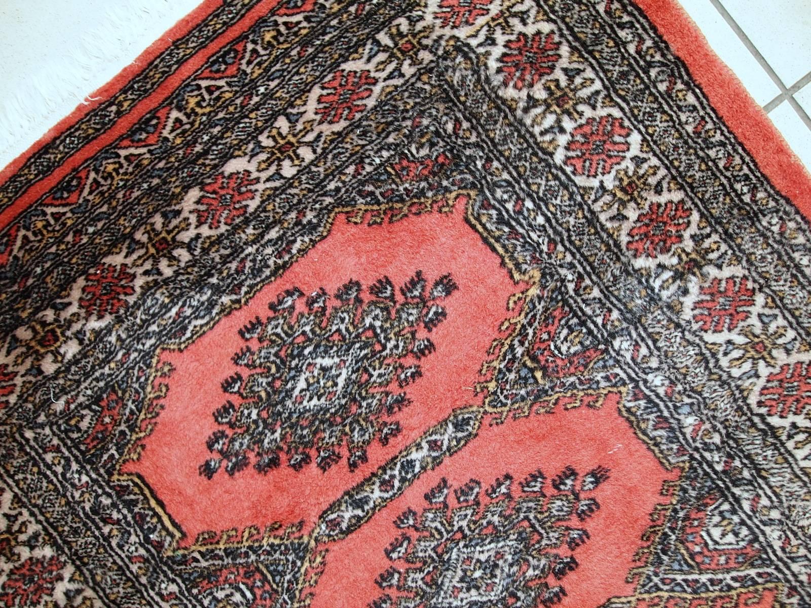 Hand-Knotted Handmade Vintage Uzbek Bukhara Rug, 1970s