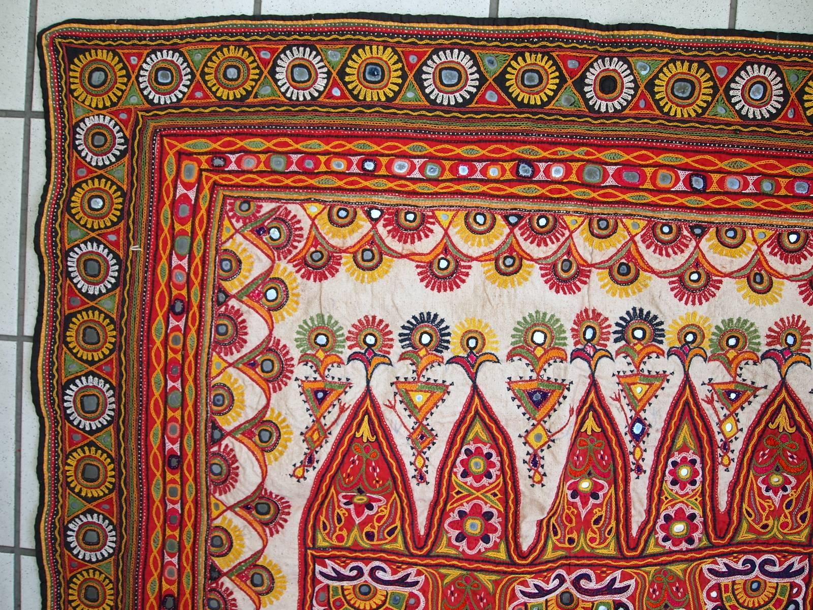 Handmade vintage Indian embroidery in original condition. This beautiful piece of art made in cotton. Beige background embroidered with colourful ornaments. The red crown is on top part and golden crown on the bottom. Some shiny metal parts are