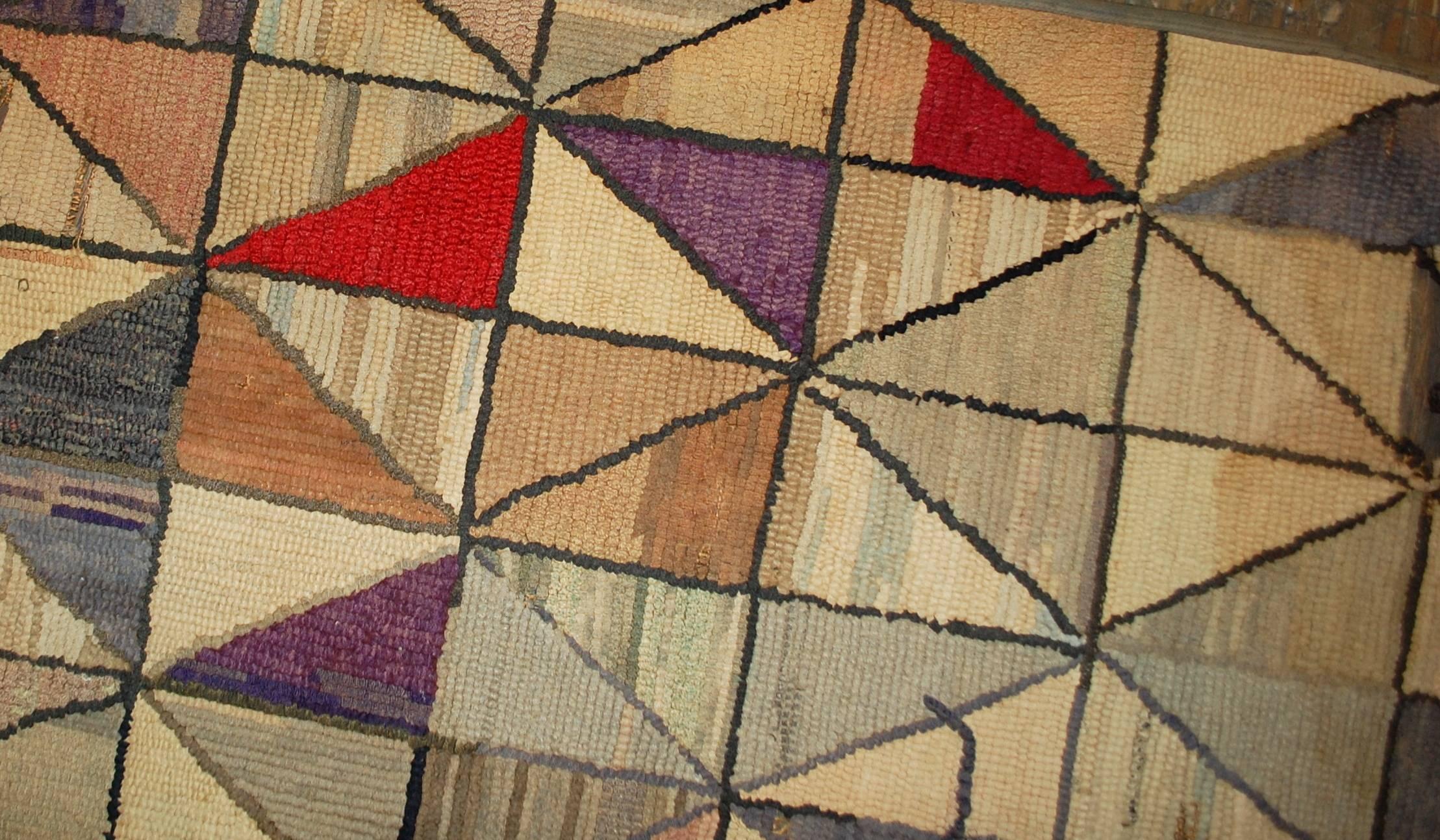 Handmade antique square American hooked rug in good condition. The rug has been made in geometric design. Very unusual pattern for that time and squarish shape makes this rug unique. The rug has been restored and now in good condition.
   