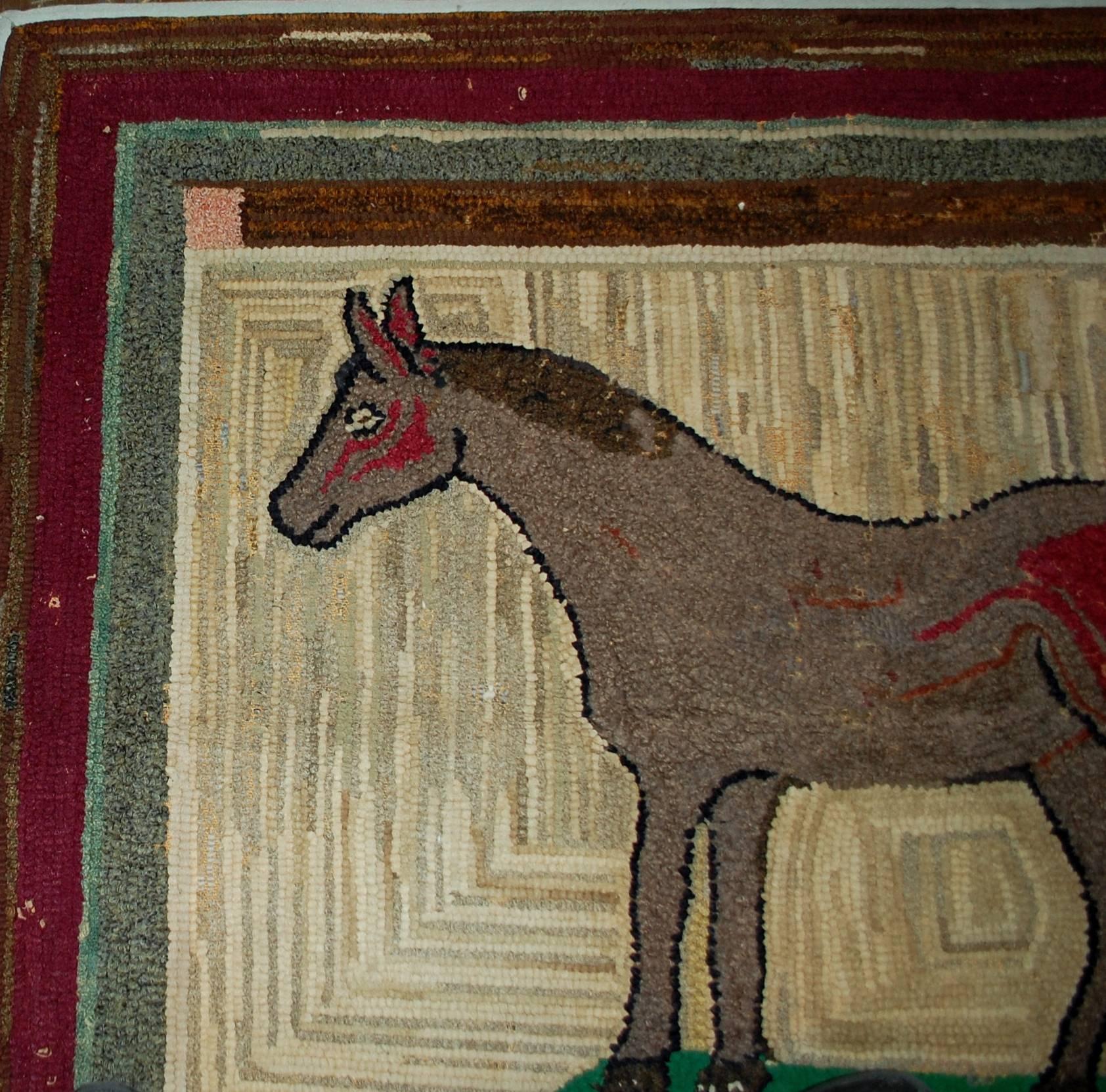 Handmade antique square American hooked rug in good condition. The rug has been made in in square shape with an image of the grey horse on the beige field. The central area surrounded by a multiply borders in burgundy, grey and brown shades. The rug