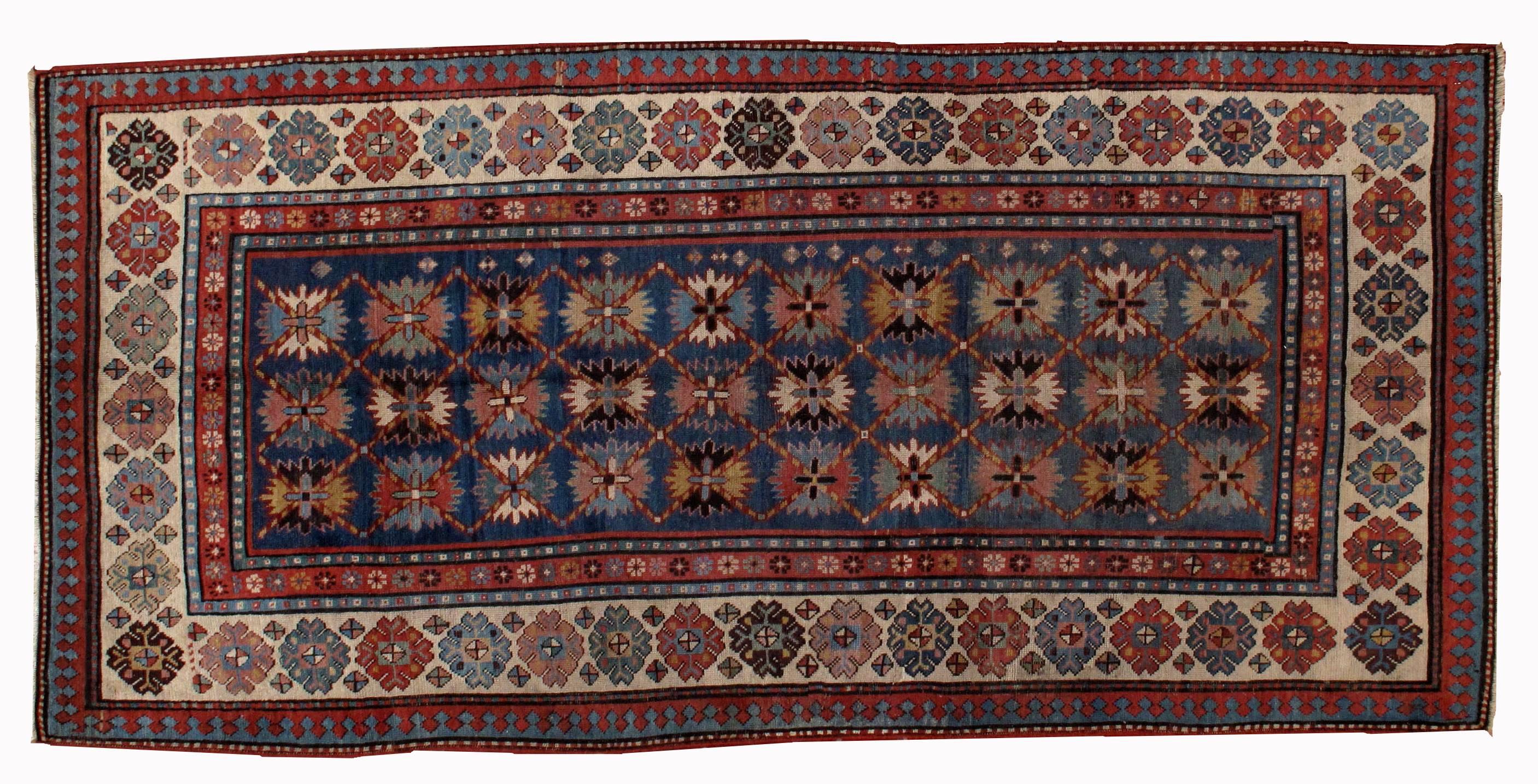 Antique handmade Caucasian Talish rug in good condition. The rug is in navy blue shade for the background with nice white border. It has nice floral design. The condition is good, it has been restored.
 