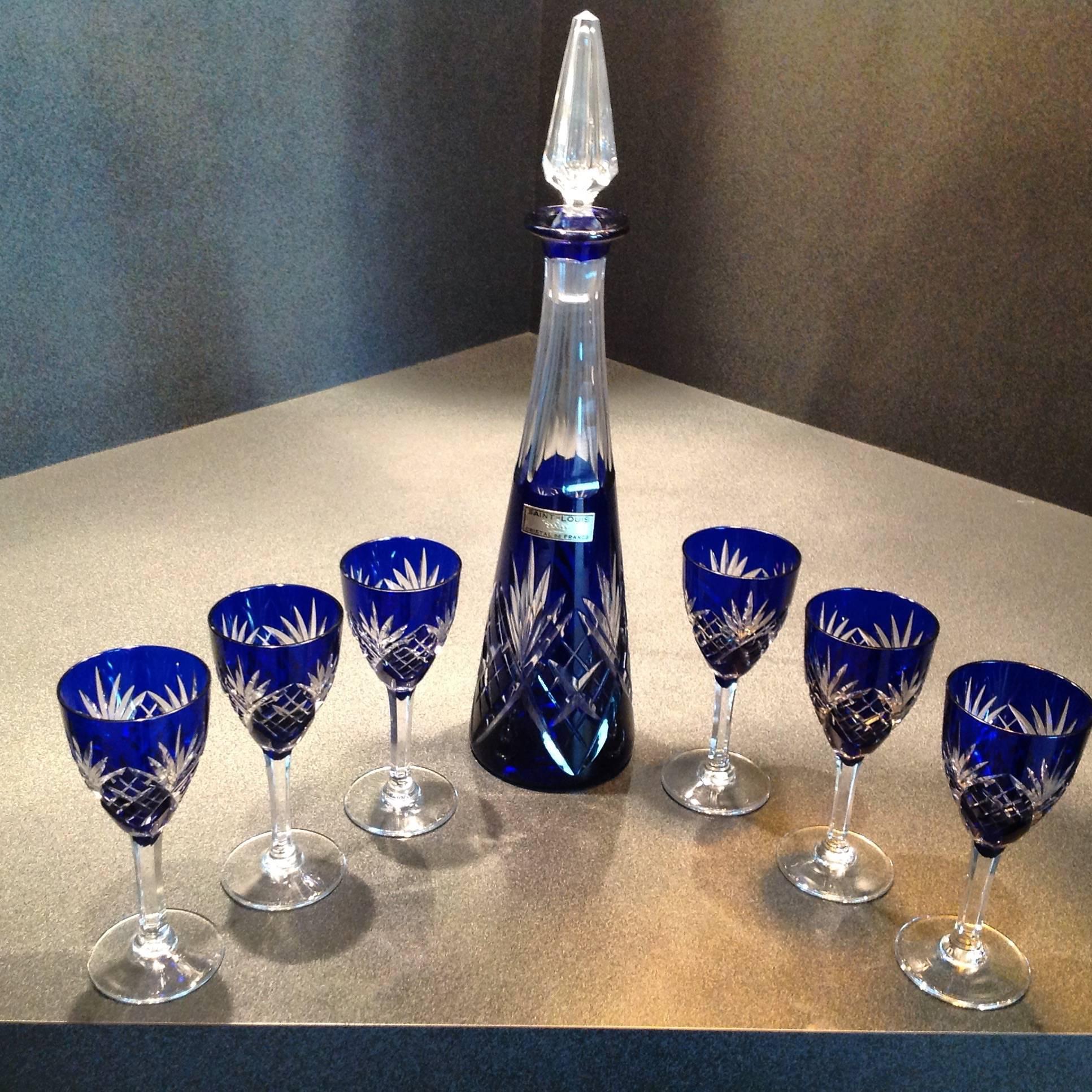 Crystal  Decanter  and 6 matching sherry glasses ,hand cut in Chantilly pattern with Cobalt  Blue overlay.