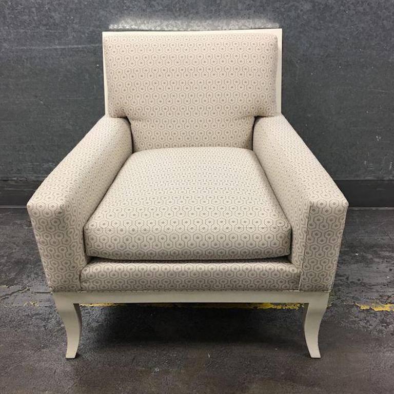 A Curtis chair by Hickory Chair. Since 1911, Hickory Chair has maintained an old-school dedication to fine craftsmanship, particularly when it comes to upholstery. From the Alexa Hampton collection, this armchair features a taupe on white honeycomb