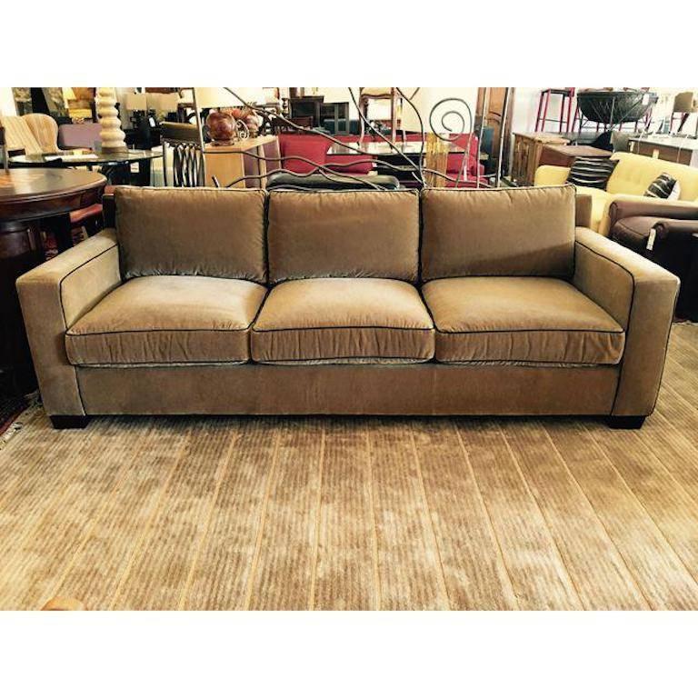 Design Plus Gallery presents the Graham sofa by Ralph Lauren. This mohair beauty features ultra blend down cushions for luxurious comfort, and contrasting welt trim and burnished mahogany tapered feet for style. Original Price: $11,000.00. Measure: