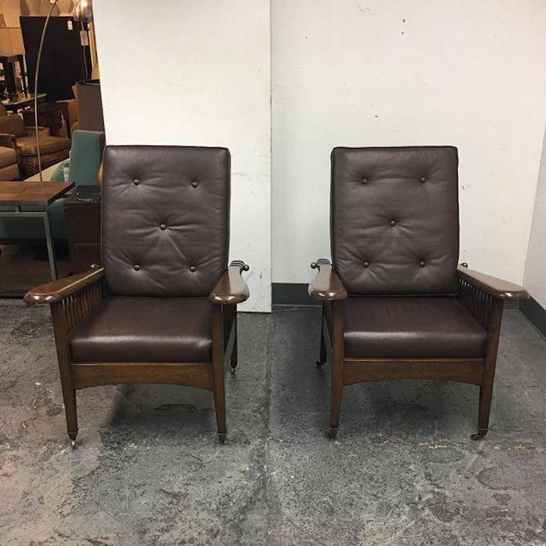 A pair of Paul Ferrante "Morris" reclining chairs. The pair has been meticulously constructed. The mechanism that allows the chairs to recline gives the chairs their name. Morris designed and patented the function at the turn of the