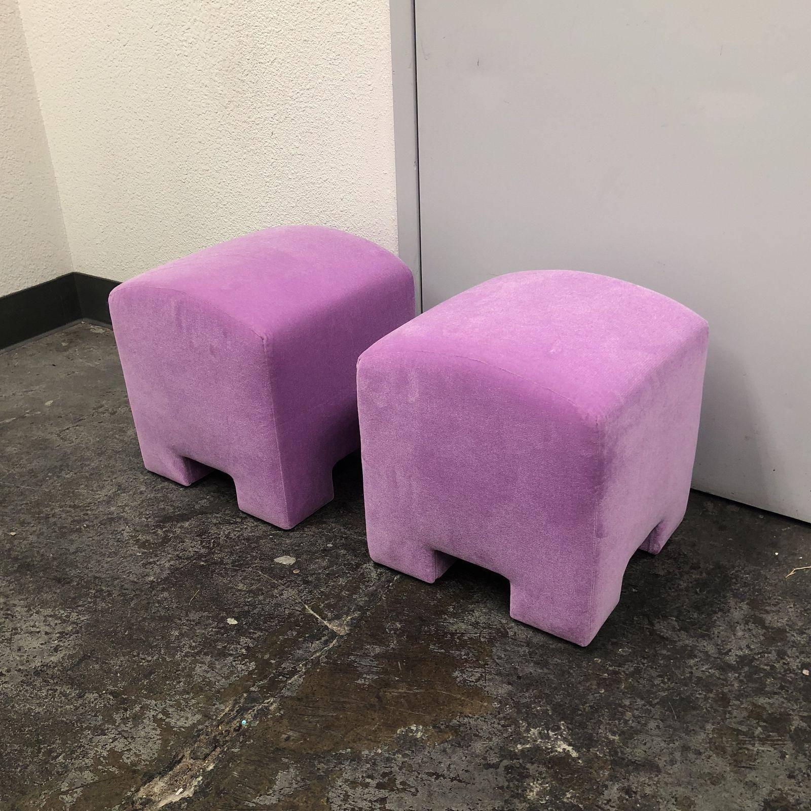 A pair of custom designed ottoman stools by Gulassa & Co. Each stool has a arch surface with tight luxurious pink velvet upholstery. From bottom to top, with clean simple lines creates a striking silhouette. Custom-made USA.