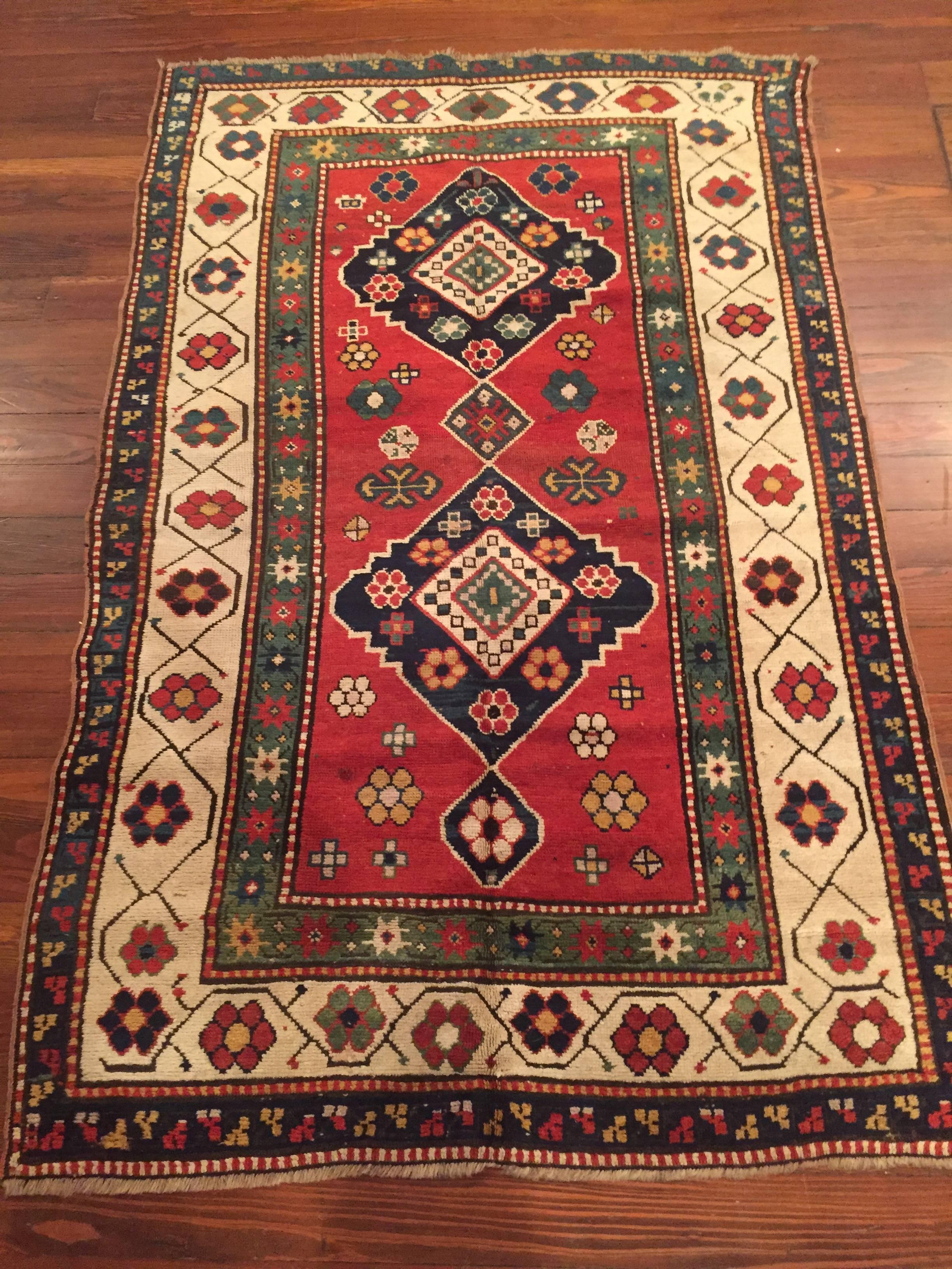 An antique Caucasian Kazak rug, circa 1890.