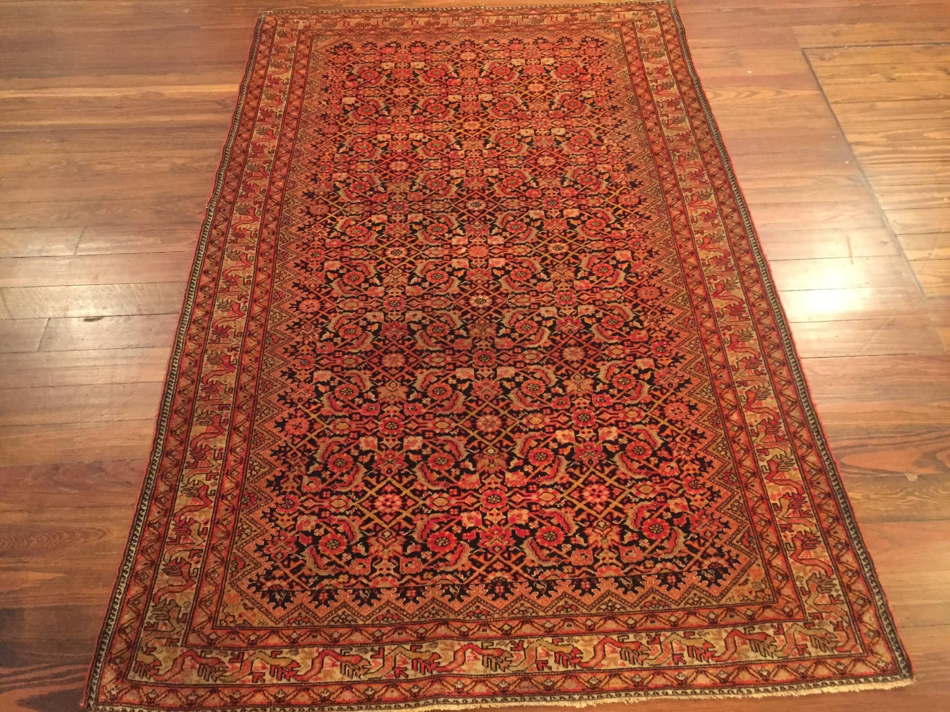 An antique Persian Malayer rug, circa 1900.