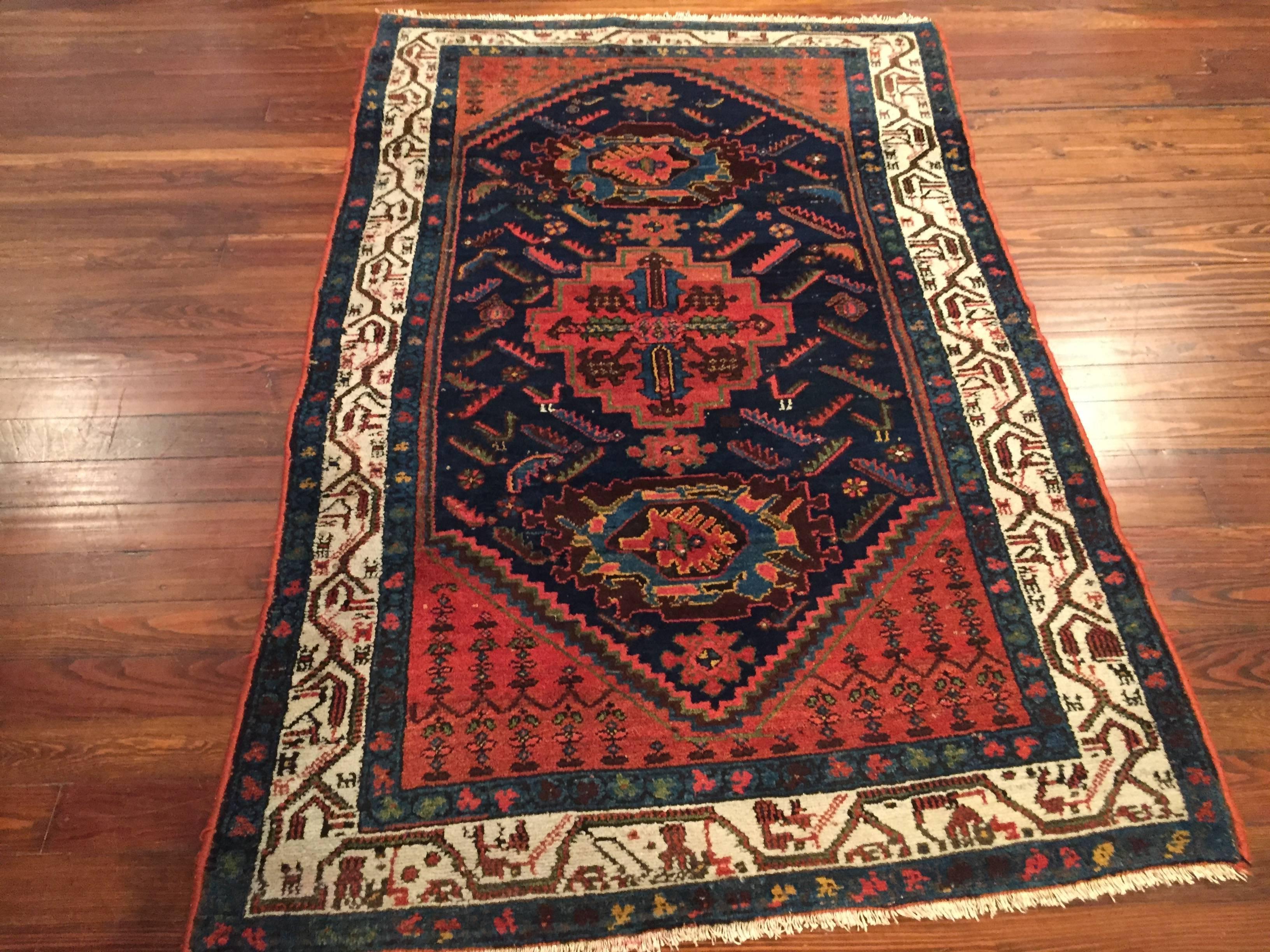 An antique Persian Hamadan rug, circa 1930.