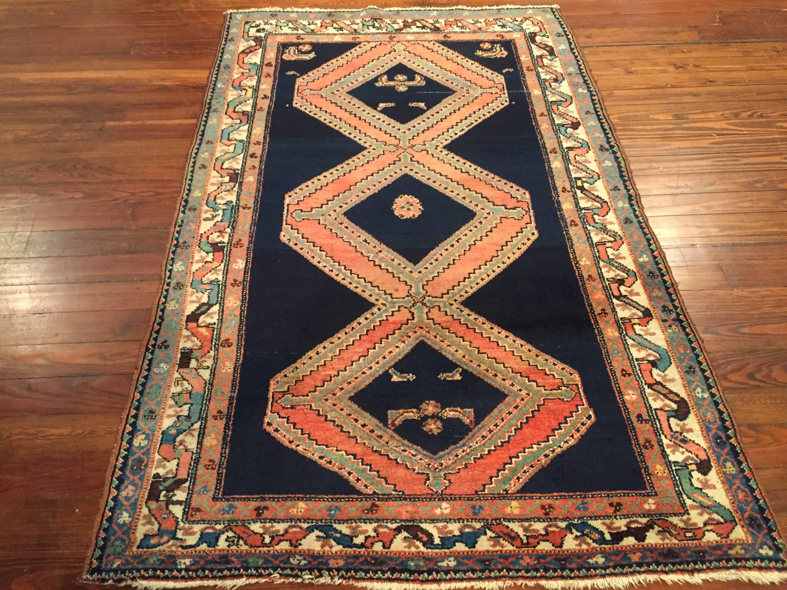 An antique Persian Malayer rug, circa 1920.