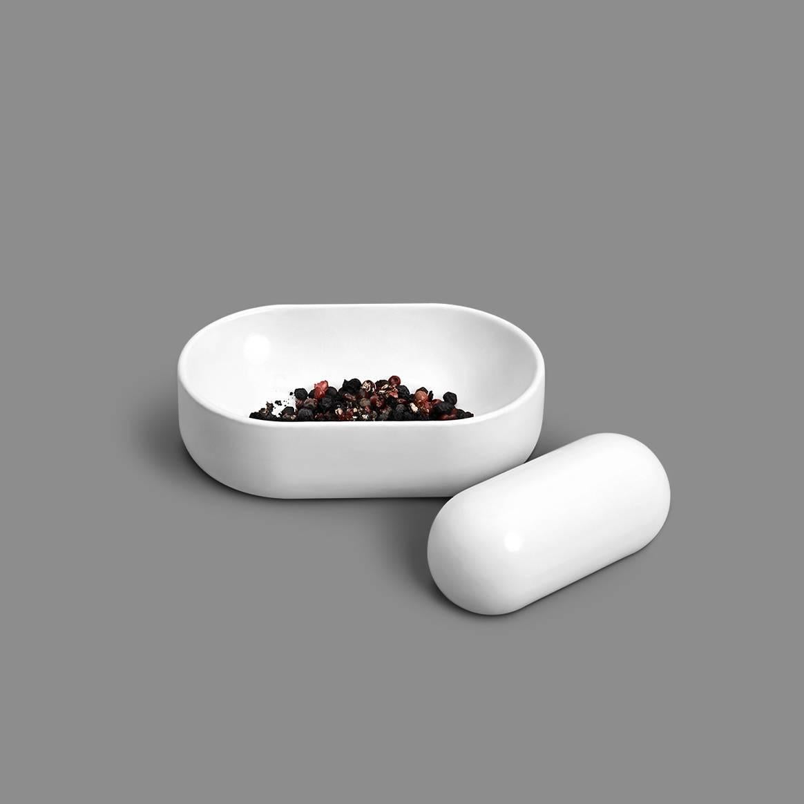 The Pill mortar and pestle was inspired by the simultaneously rudimentary and nuanced act of crushing and mixing spices. This design explores multiple thicknesses in porcelain and various finishes, only possible through 3D printing, to explore a