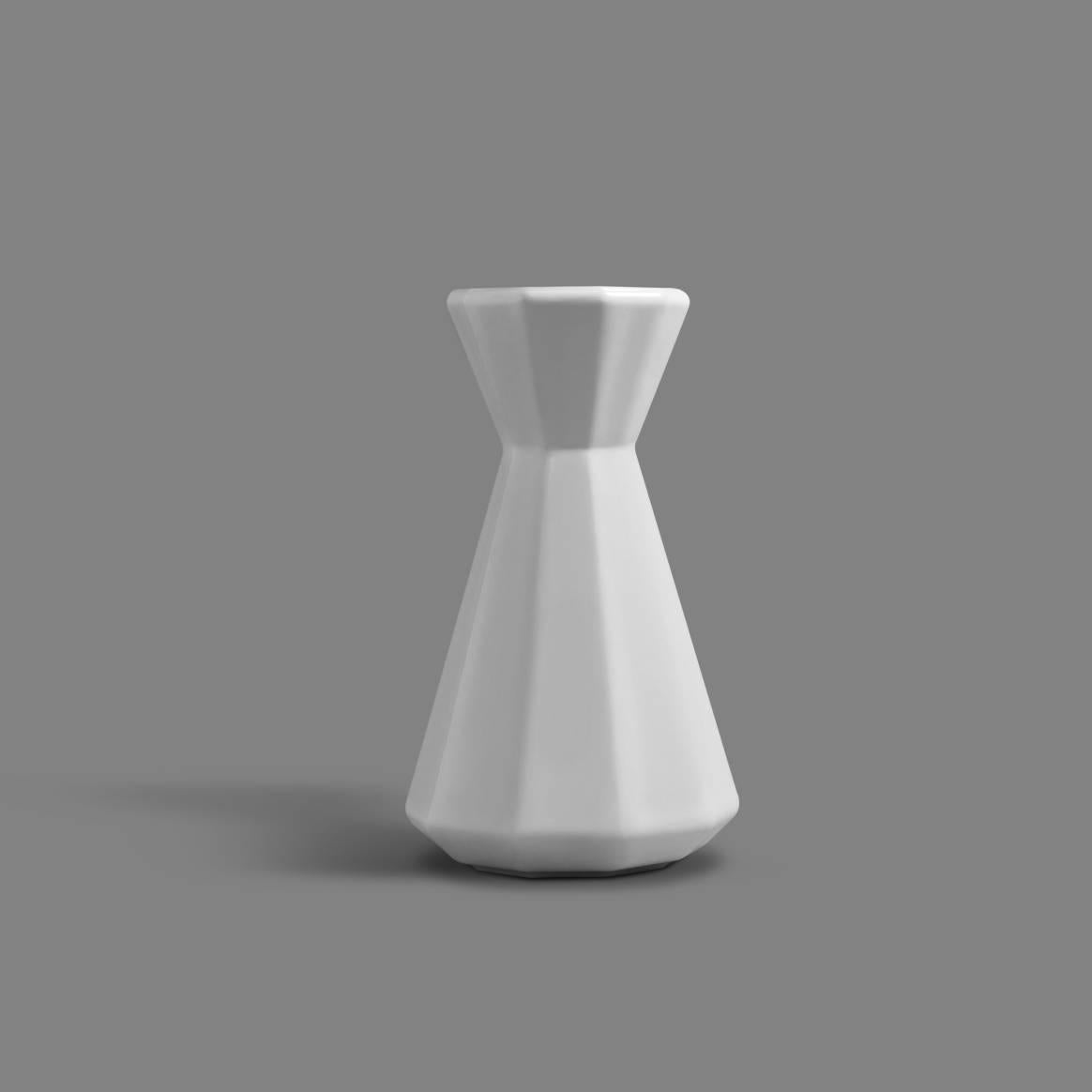 This refined, geometric carafe set was designed to embody the pleasure of sharing something to drink - a stackable carafe and cup set whose lines and form emulate its eponymous flower, and only possible through 3D printing. Each product is produced