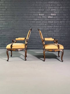 Pair of French Louis XV Carved Walnut Fauteuil Armchairs with Floral Needlepoint