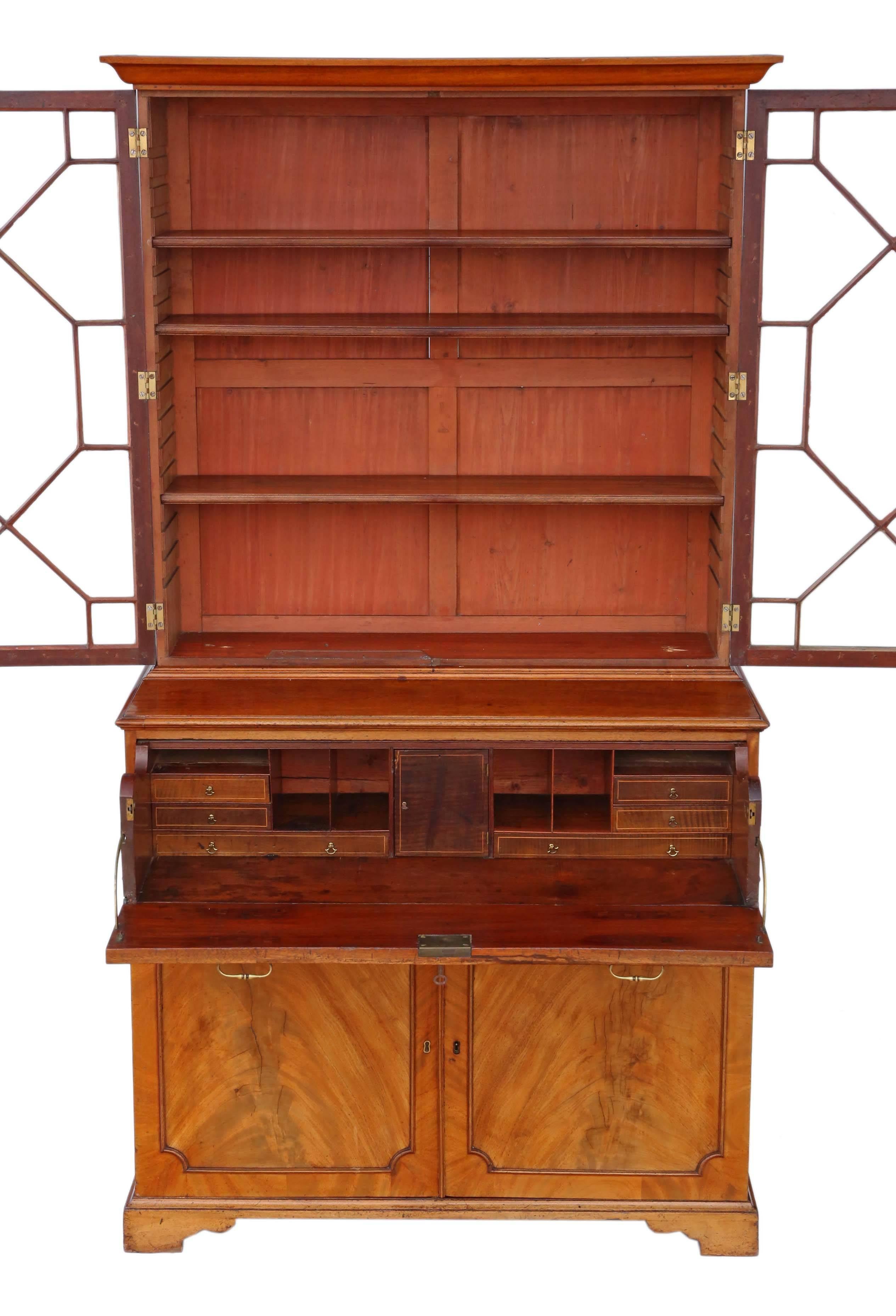 Antique Georgian mahogany secretaire bookcase, circa 1800.

Solid and strong, with no loose joints. Full of age, character and charm. Great patina and a lovely light mahogany color.

Would look great in the right location! We have keys, but not