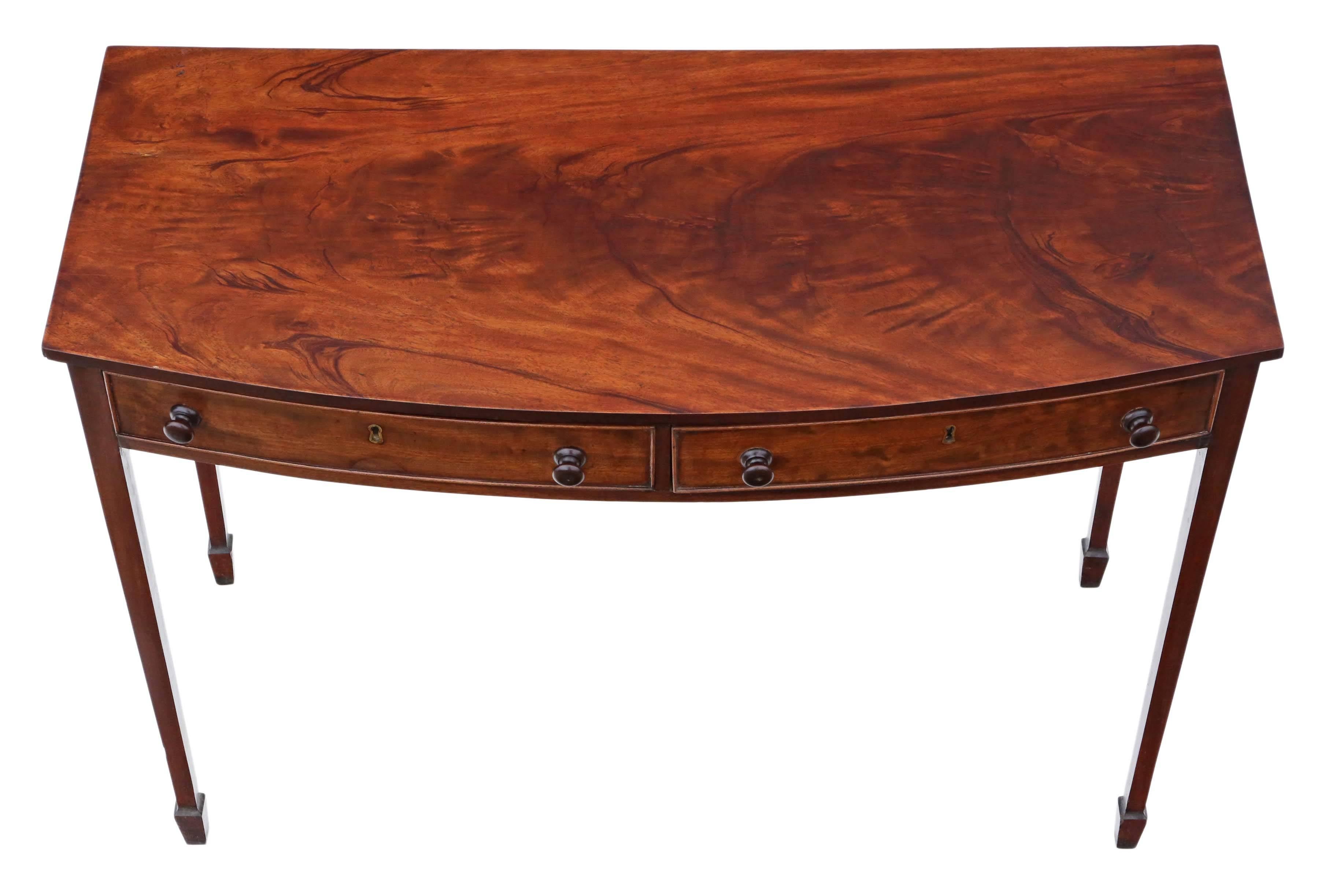 Antique quality bow front flame mahogany desk writing table, 19th century and later. Simple elegant style.

No loose joints. Full of age, character and charm. The drawers slide freely.

Would look great in the right location! No