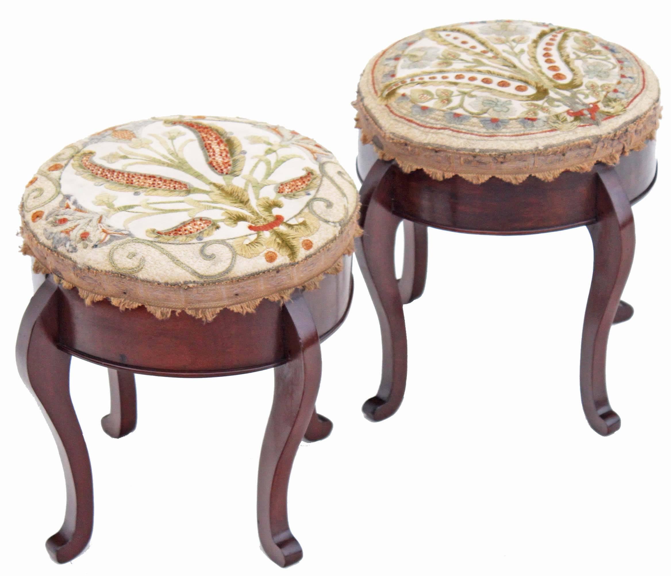 Antique pair of 19th century Victorian (or possibly Edwardian) embroidered needlework foot stools.

These are very rare and unusual items.

Lovely proportions and styling.

Solid, with no loose joints.

335mm diameter tops, overall maximum