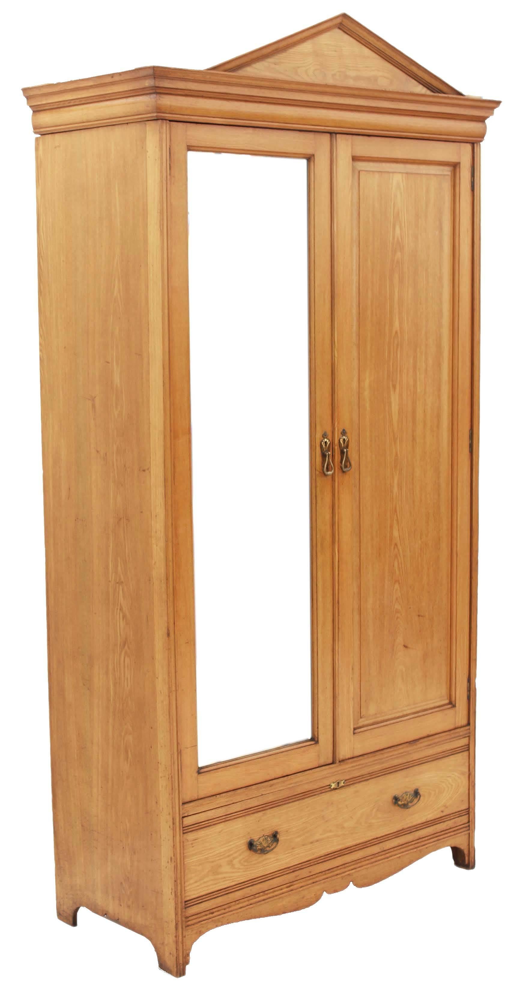 
Description

Antique tall large quality Gothic late Victorian 19th century (could be Edwardian early 20th century) ash (similar to light oak) armoire wardrobe.

 Very large and tall proportions making it quite imposing, with clean Gothic