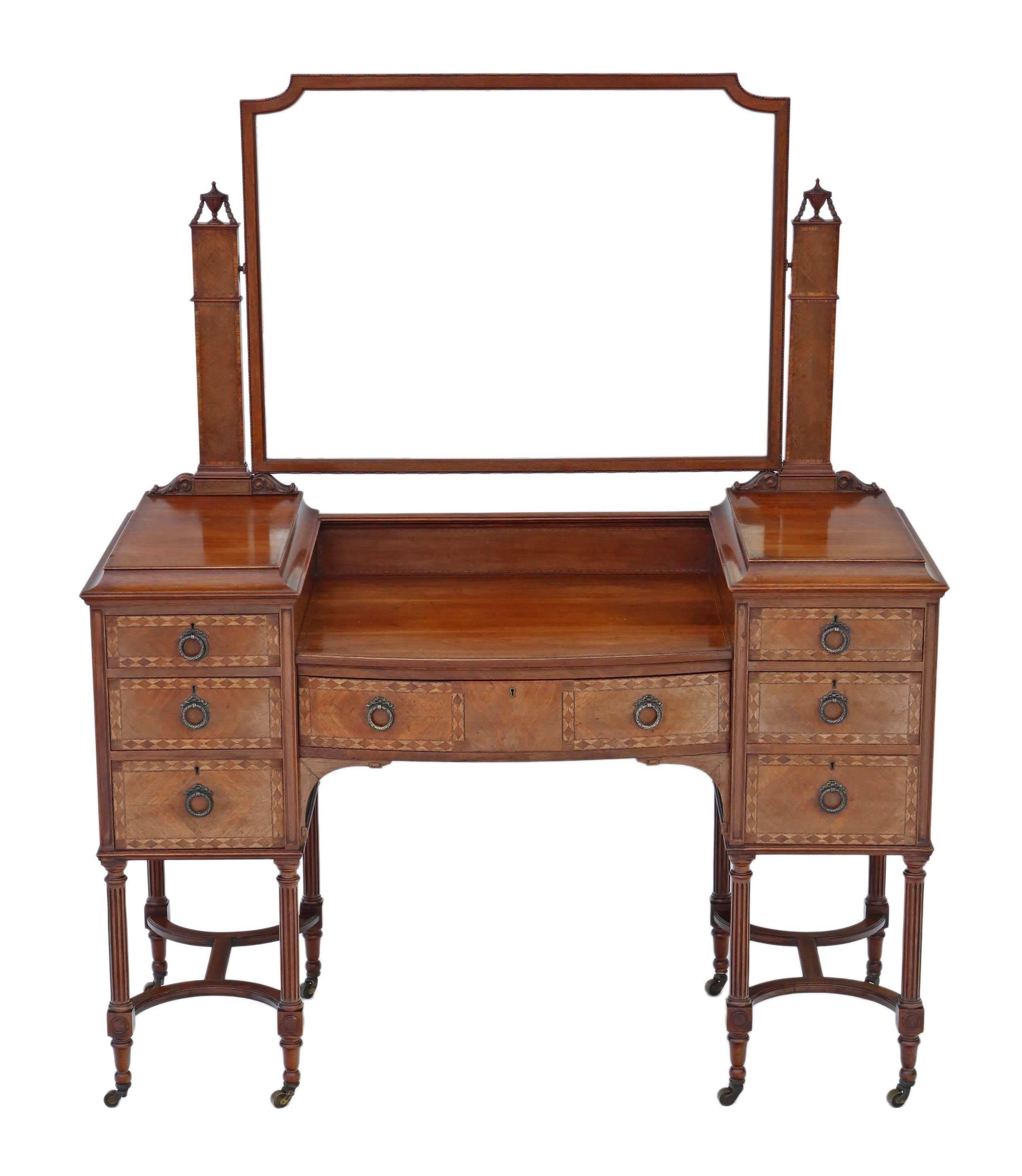 Antique quality Edwardian circa 1900-1910 inlaid rosewood dressing table. 

Solid and strong, with no loose joints and no woodworm. Full of age, character and charm. The mahogany lined drawers slide freely. The mirror holds position well. The