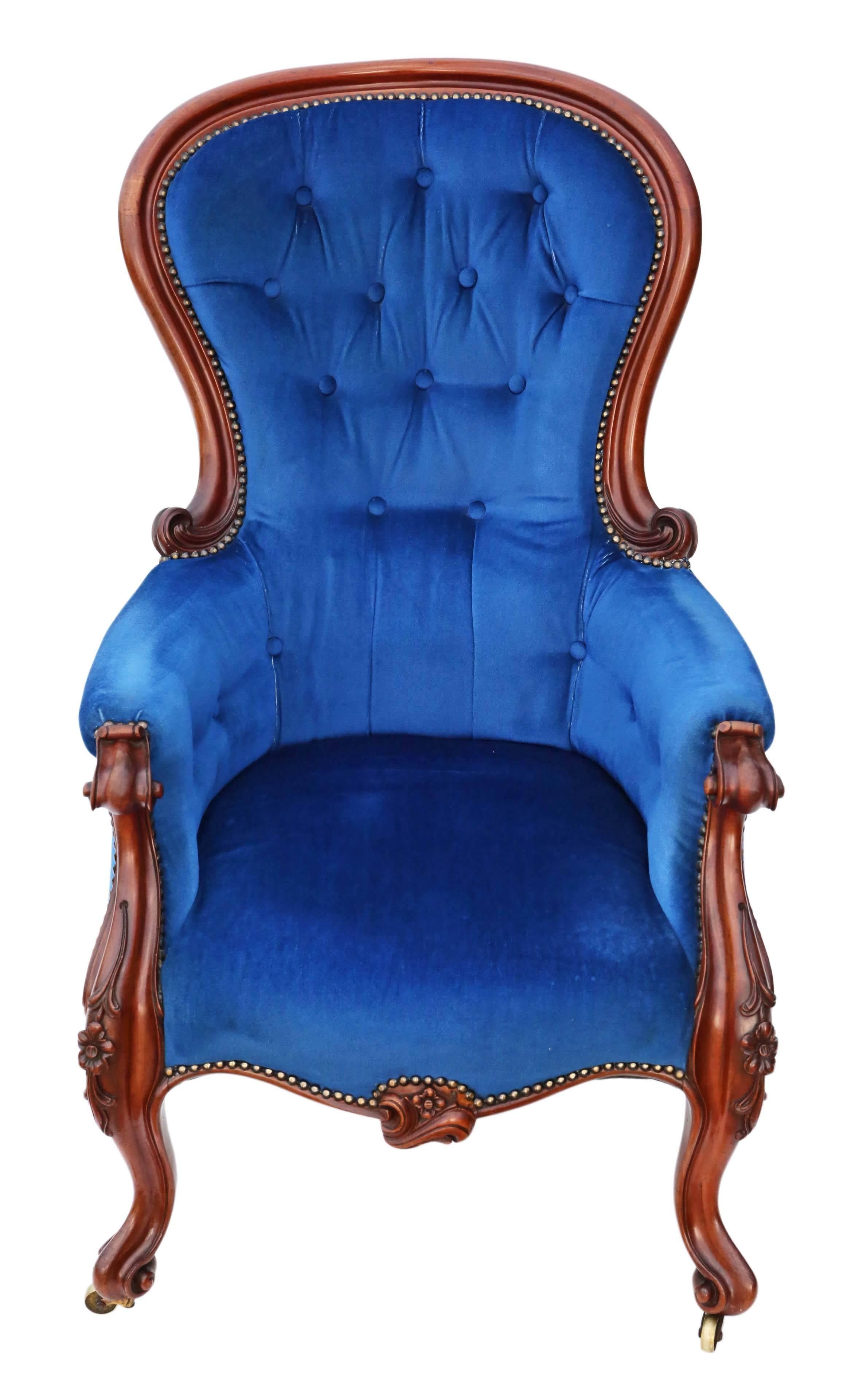 Antique quality Victorian circa 1870 mahogany slipper spoon back armchair.

Solid, no loose joints and no woodworm. Full of age, character and charm. A very decorative chair. The royal blue velour button back upholstery is not new, but has little