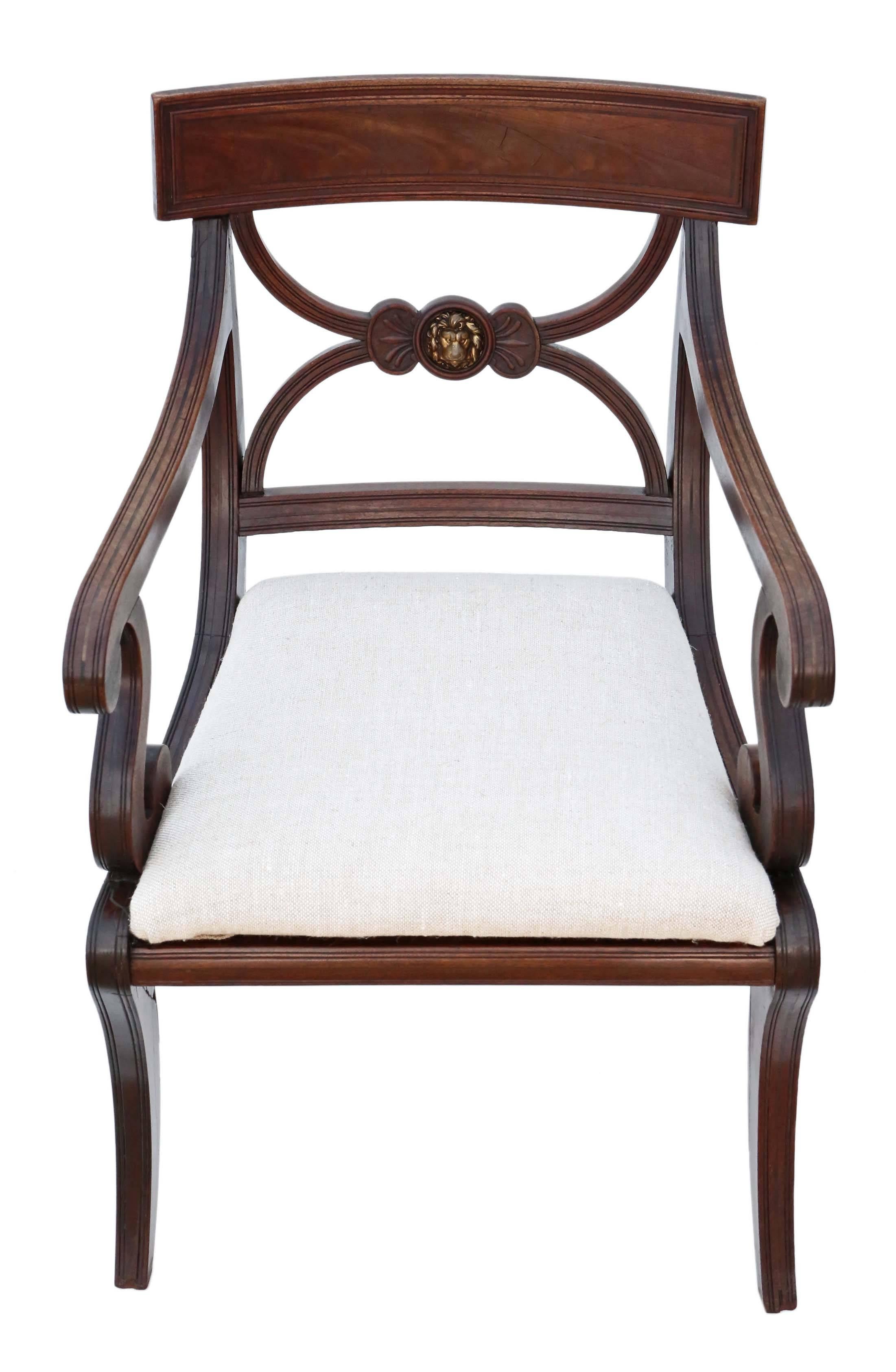 Antique quality Regency mahogany elbow desk chair, circa 1825. Could also be used as a side, hall or carver chair.

Solid and strong, with no loose joints and no woodworm. Full of age, character and charm. An elegant attractive chair with the best