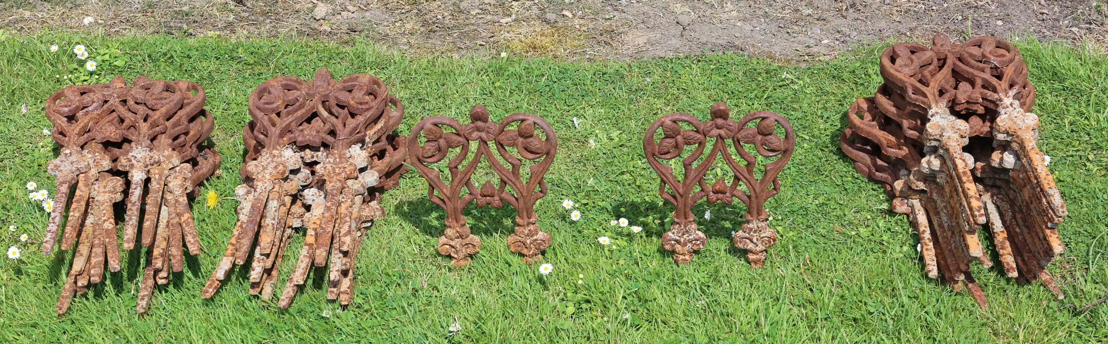 Antique quality set of 34 early/mid-20th Century cast iron lawn edgings.

Solid and strong.

Would look great in any period setting!

Overall maximum dimensions each: 18cm W x 37cm H x 1.2cm thick.

Very good condition with a fantastic rusty