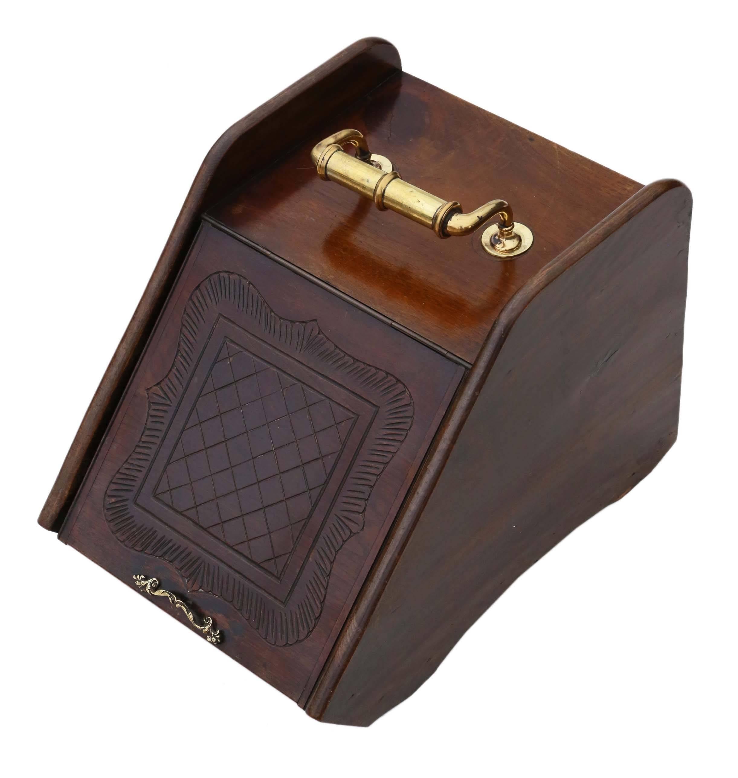 Antique Victorian, circa 1900 carved walnut coal scuttle box or purdonium.

A heavy and solid piece, with no woodworm. The door works Fine.

This is a lovely rare quality piece, that is full of age charm and character. Complete with a brass