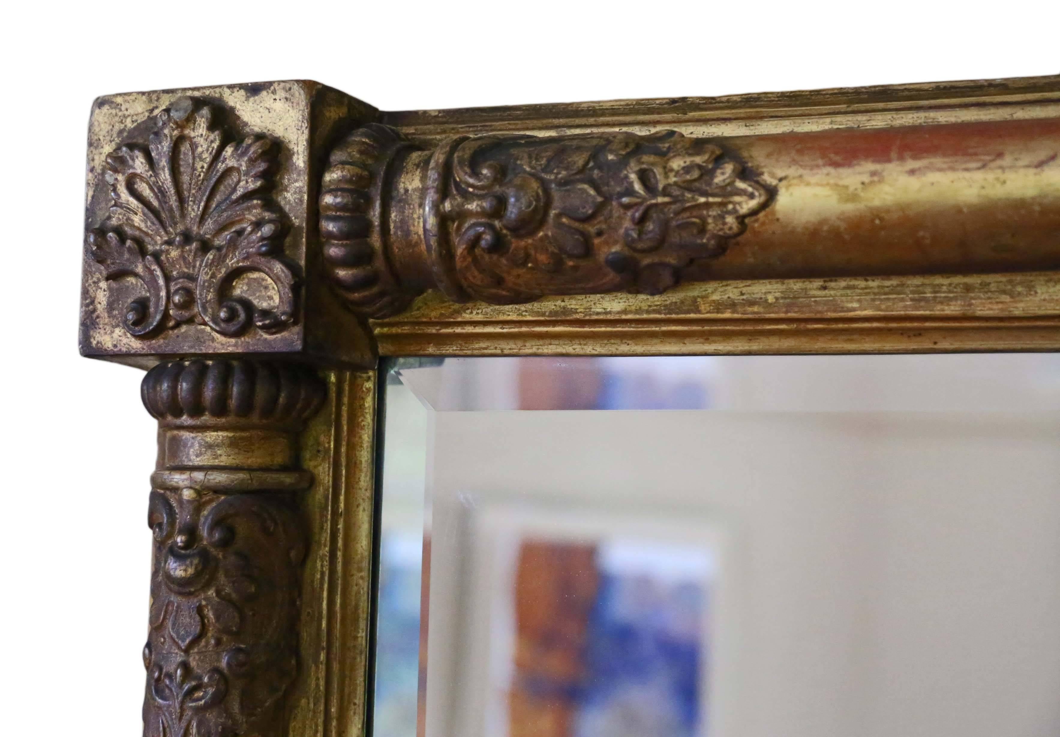 Antique large 19th century Victorian gilt overmantel wall mirror.

This is a lovely mirror, that is full of age, charm and character. Great patinated gilt frame which has been touched up here and there, but some of the original gilding remains on