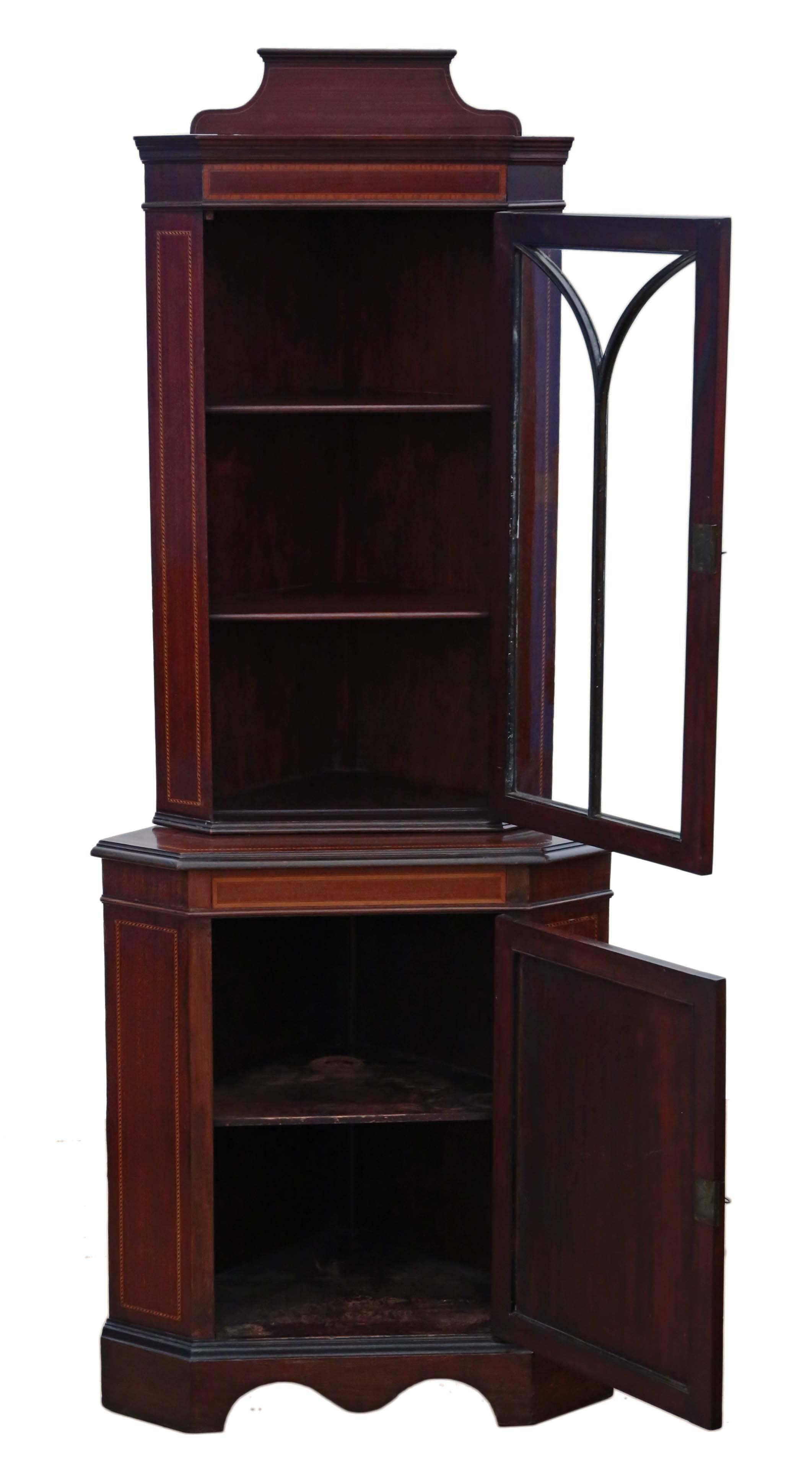 Antique quality Edwardian mahogany glazed corner cupboard display cabinet. Dates from circa 1910.

The doors open freely and we have a key. Much better than most, a rare find. No woodworm.

Would make a real focal point, with crossbanding,