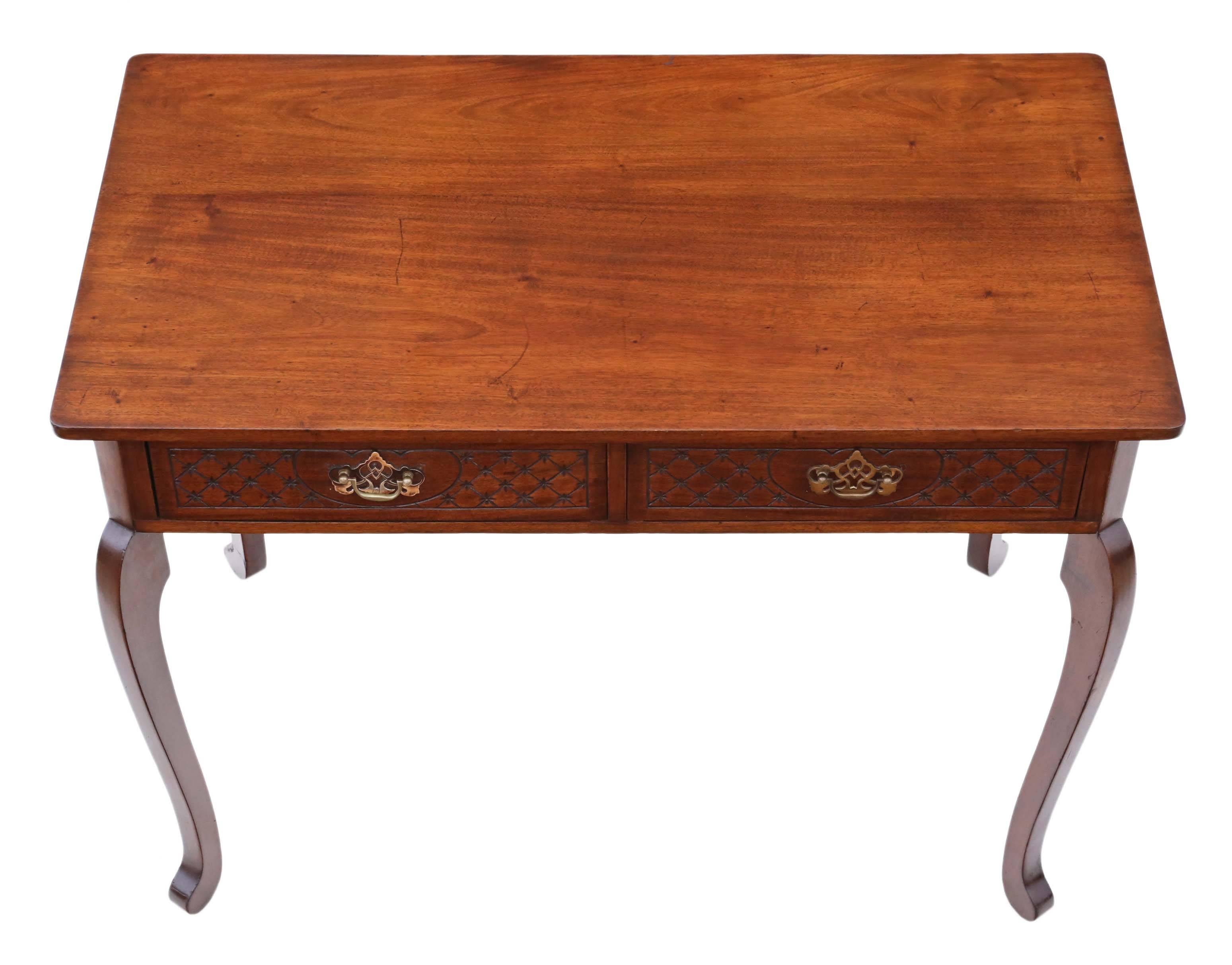 Antique Victorian circa 1900 mahogany writing desk or dressing table. 

No woodworm.

The table is solid and strong, with no loose joints and the drawers slide freely.

Overall dimensions 100 cm W x 56cm D x 77cm H (60.5cmH knee