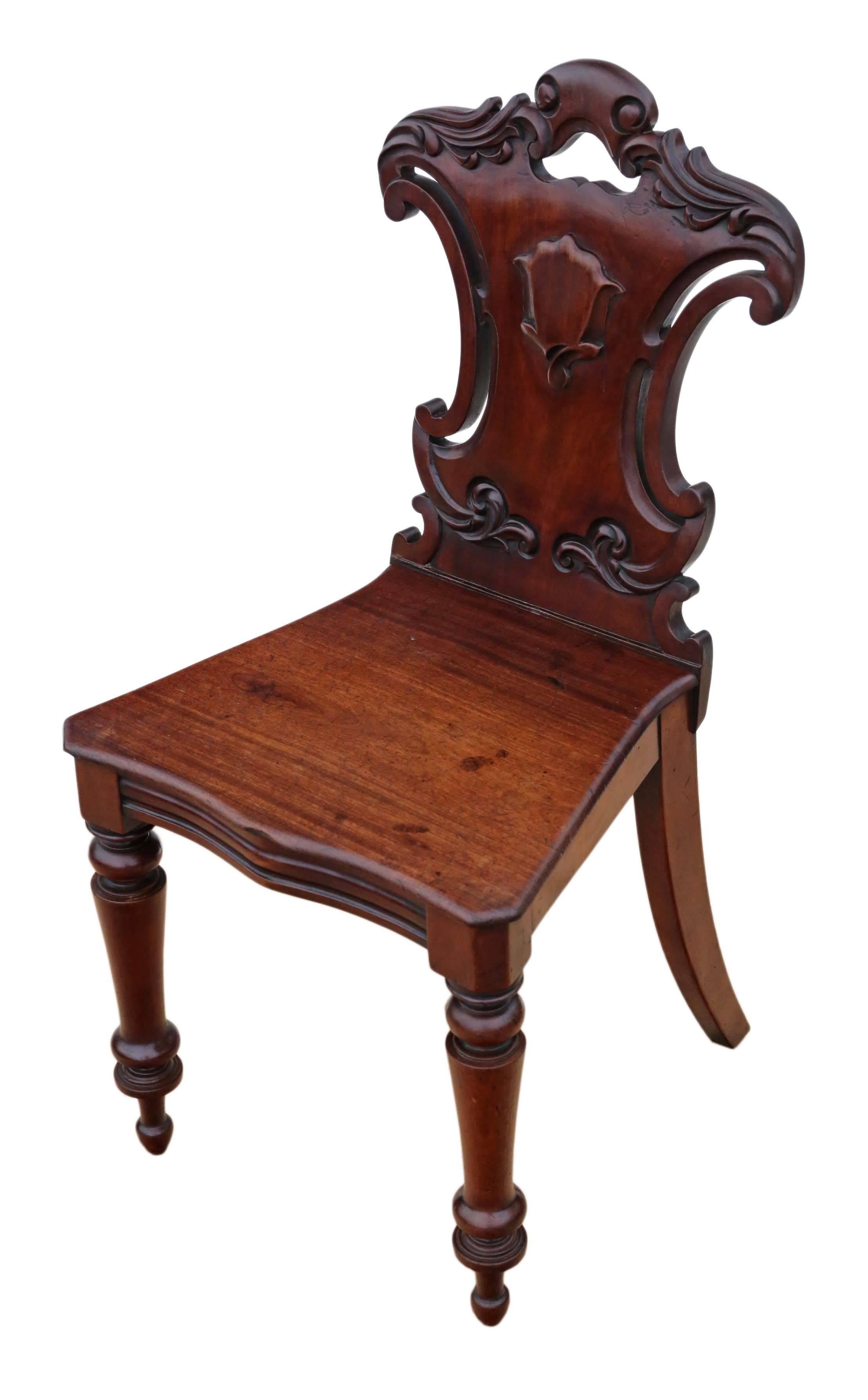 Antique Victorian circa 1850-1870 carved mahogany hall chair.

A great rare find, with nice colour, age, patina and charm. Very decorative.

No loose joints.

Overall maximum dimensions:

43cm W x 45cm D x 86cm H (43cm H seat).

Historic