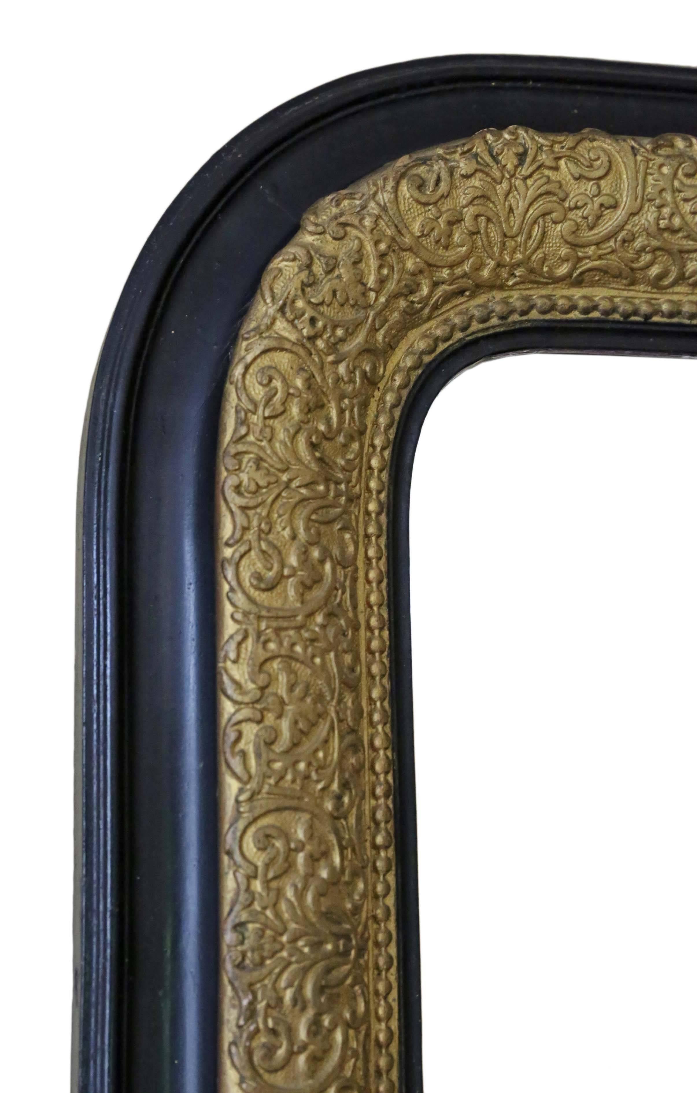 Antique Victorian, circa 1900 ebonized / gilt wall mirror or overmantel.

This is a lovely mirror, that is full of age, charm and character, no woodworm.

Would look amazing in the right location.

The mirror is in good condition with light