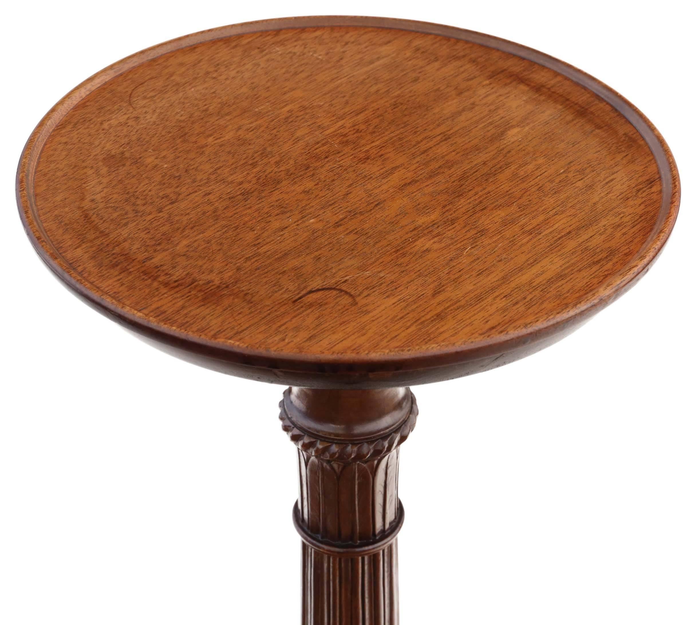 Antique late Victorian, circa 1900 mahogany torchiere or jardiniere table pedestal stand.

This item is fine quality, solid and heavy, with no loose joints. Very stable.

No woodworm.

An attractive piece with a lovely fluted stem and a