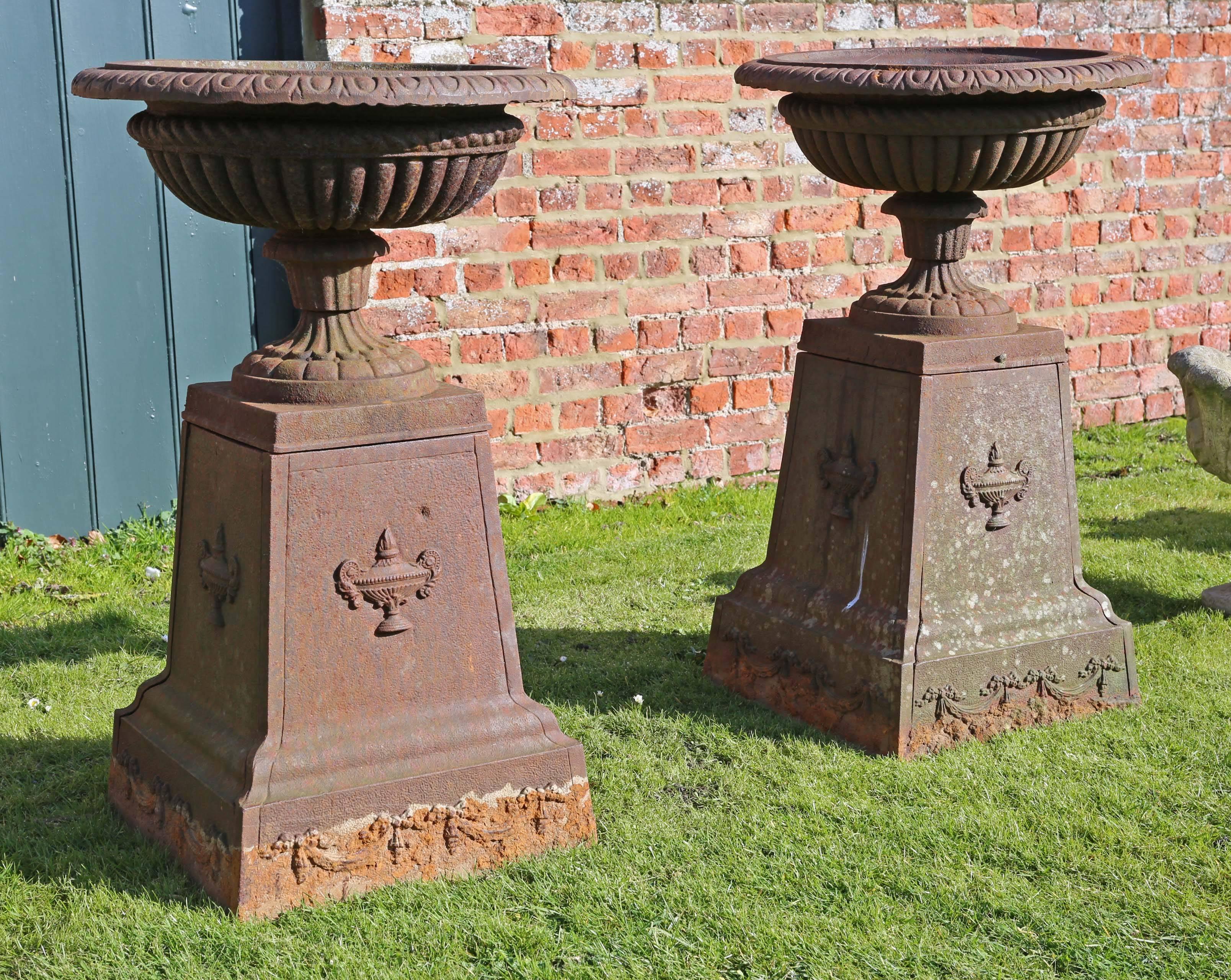 British Large Antique Pair of Victorian Cast Iron Planters Classical Urns on Plinths For Sale