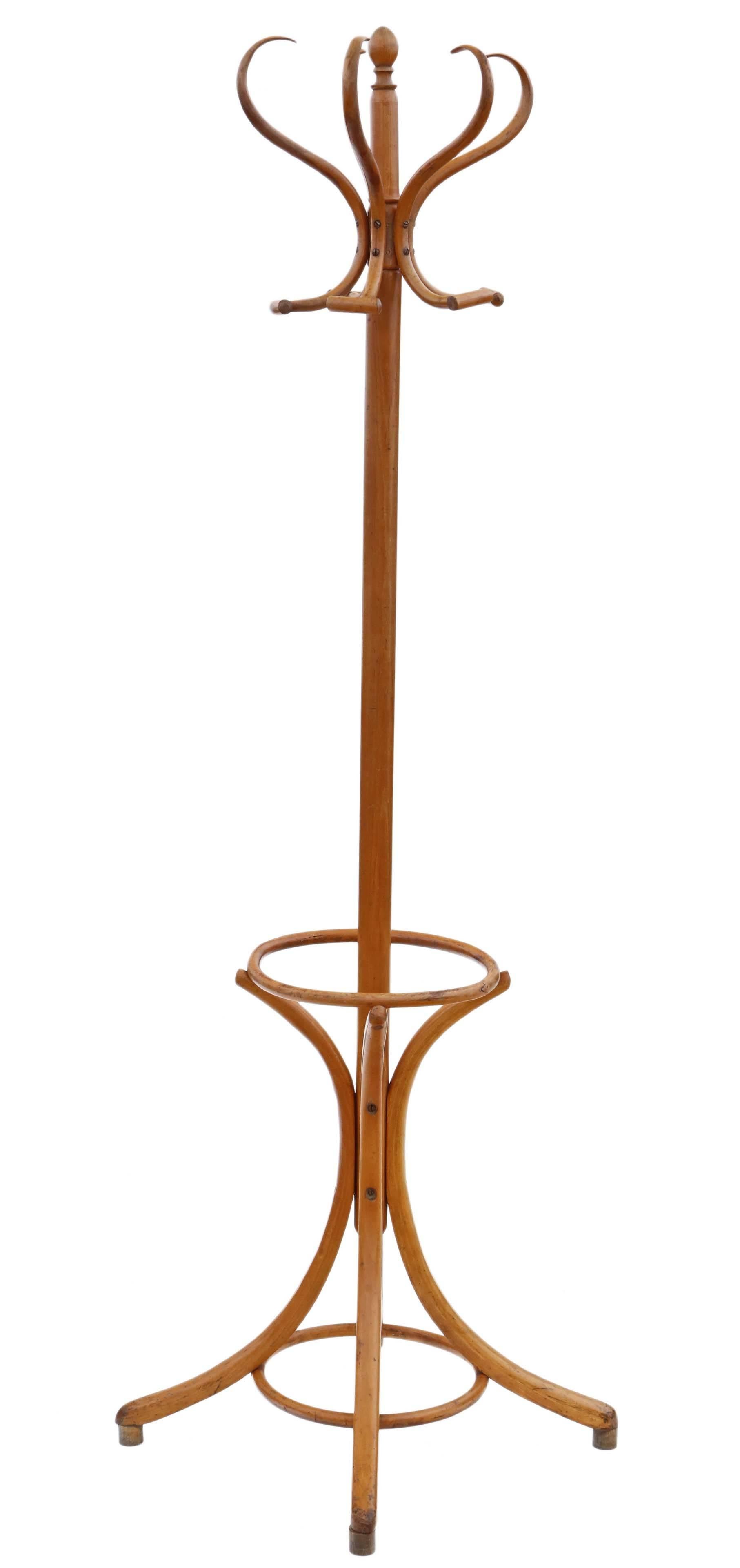 Antique bentwood hall, coat, hat, stick, umbrella stand. Five rotating combined coat and hat hooks.

Around 50 years old. Lovely age and charm.

Solid and strong with no loose joints. Some historical cracking, as is usual for this type of piece,