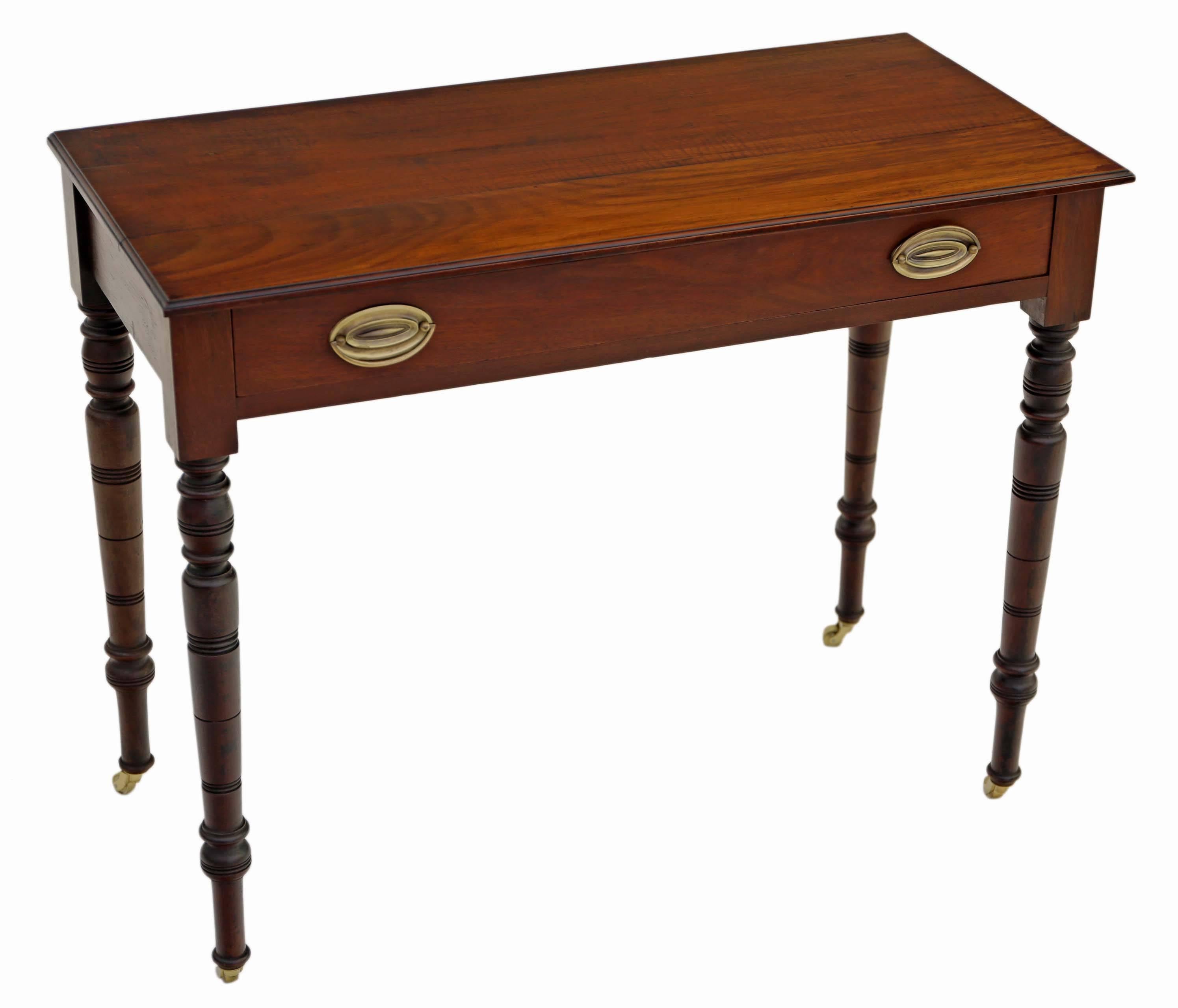 Antique Victorian circa 1900 walnut side writing occasional table desk.

Fabulous proportions, color age and patina. No woodworm.

The table is solid, with no loose joints and the drawer slides freely.

Overall dimensions 89.5cm W x 43cm D x