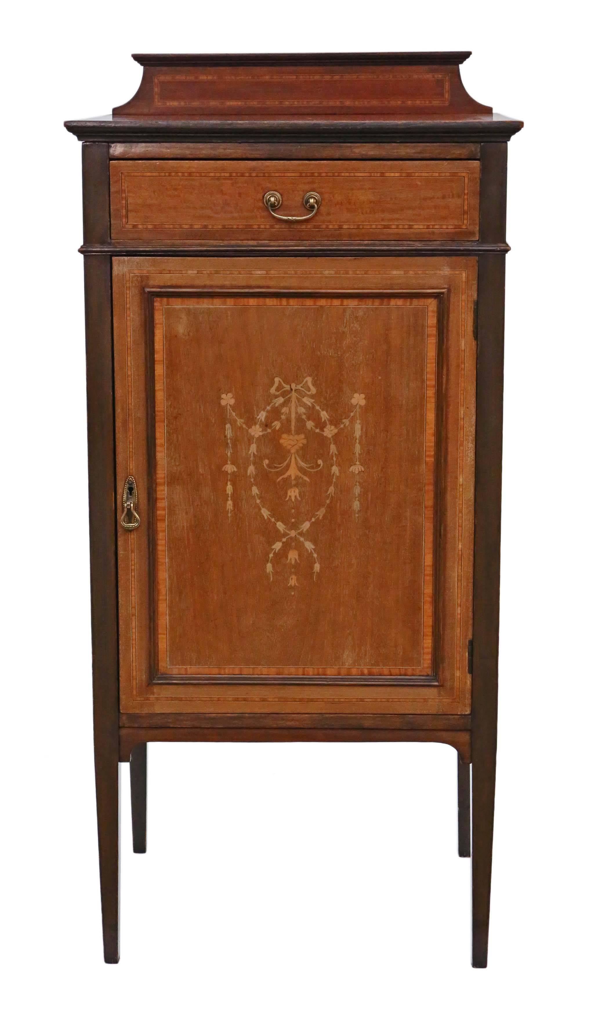 Antique quality Edwardian mahogany music or bedside cabinet. Labelled 'McEwen & Sons of Wick'

This is a fine quality presentation piece (presented on 26 December 1912). The mahogany lined drawer slides freely.

Solid, with no loose joints or