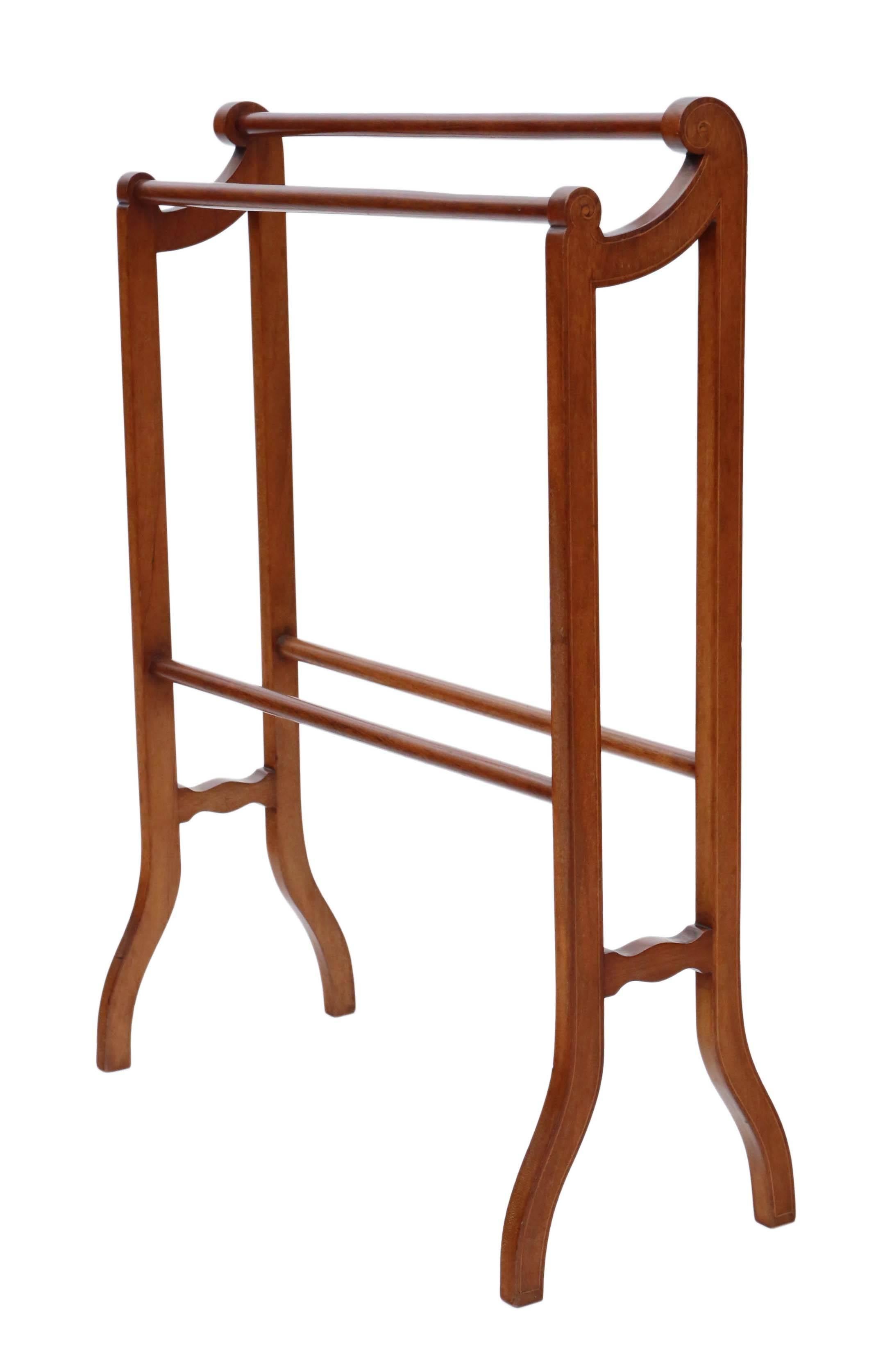Antique quality Edwardian inlaid mahogany towel rail stand.

This item is solid, with no loose joints.

No woodworm.

Good age and patina, would look amazing in the right location! Attractive line inlay.

Overall maximum dimensions:

70cm