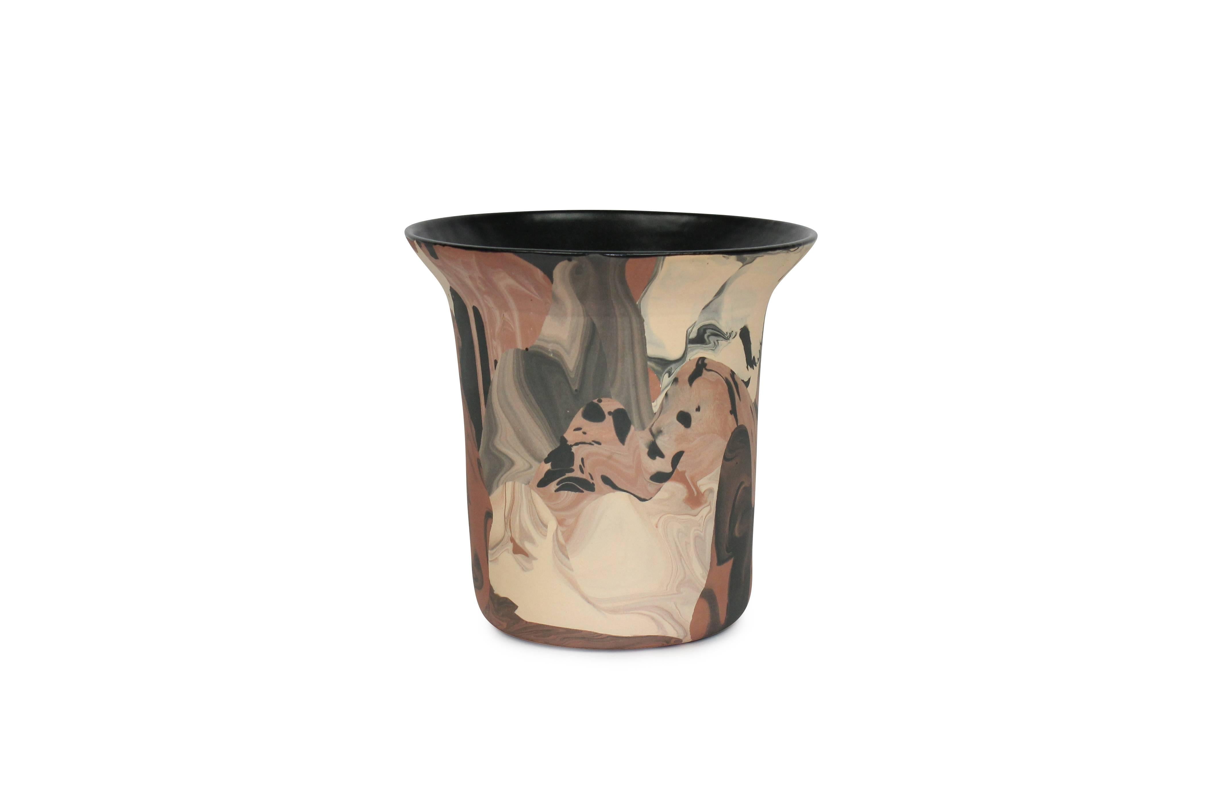 Handmade ceramic stoneware vase or vessel.  Marbled raw colored clay exterior with satin black glaze interior.  Available in other options.  Handmade by Malka Dina in Brooklyn, NY.
Due to the handmade nature of this item, each piece will be slightly