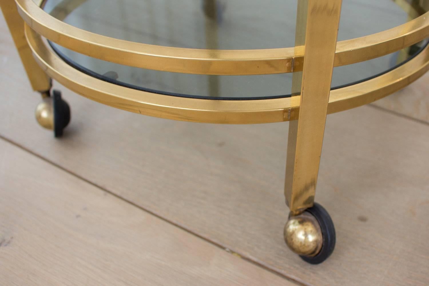 Hollywood Regency Vintage Brass and Smoked Glass Two-Tier Side Table For Sale