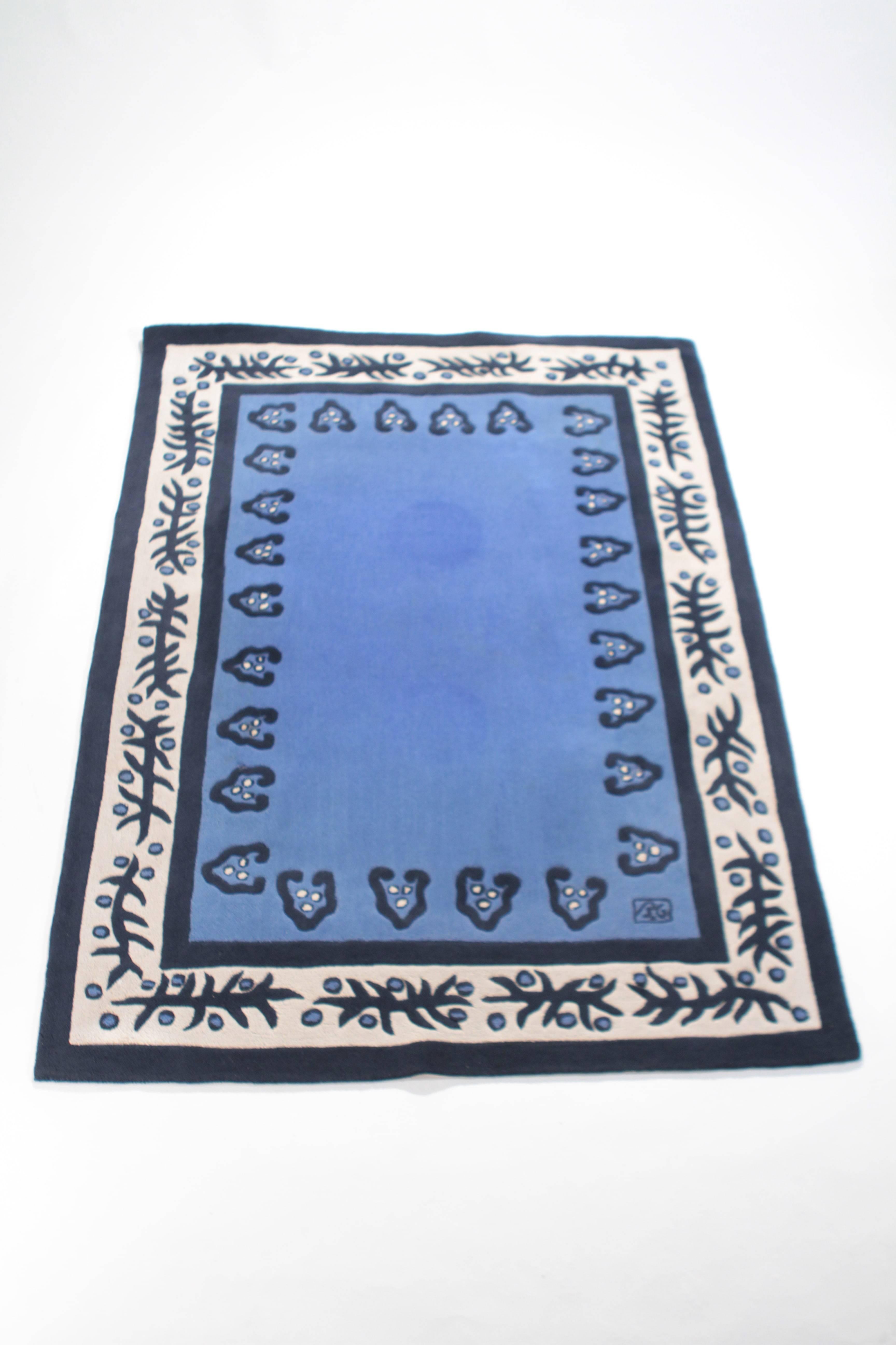 Rêverie carpet designed by Garouste and Bonetti in tufted wool, manufactured by Sam Laïk in 1993. This beautiful piece features a very poetic blue pattern and is signed BG.
This rug has been professionally cleaned, and few marks from previous use