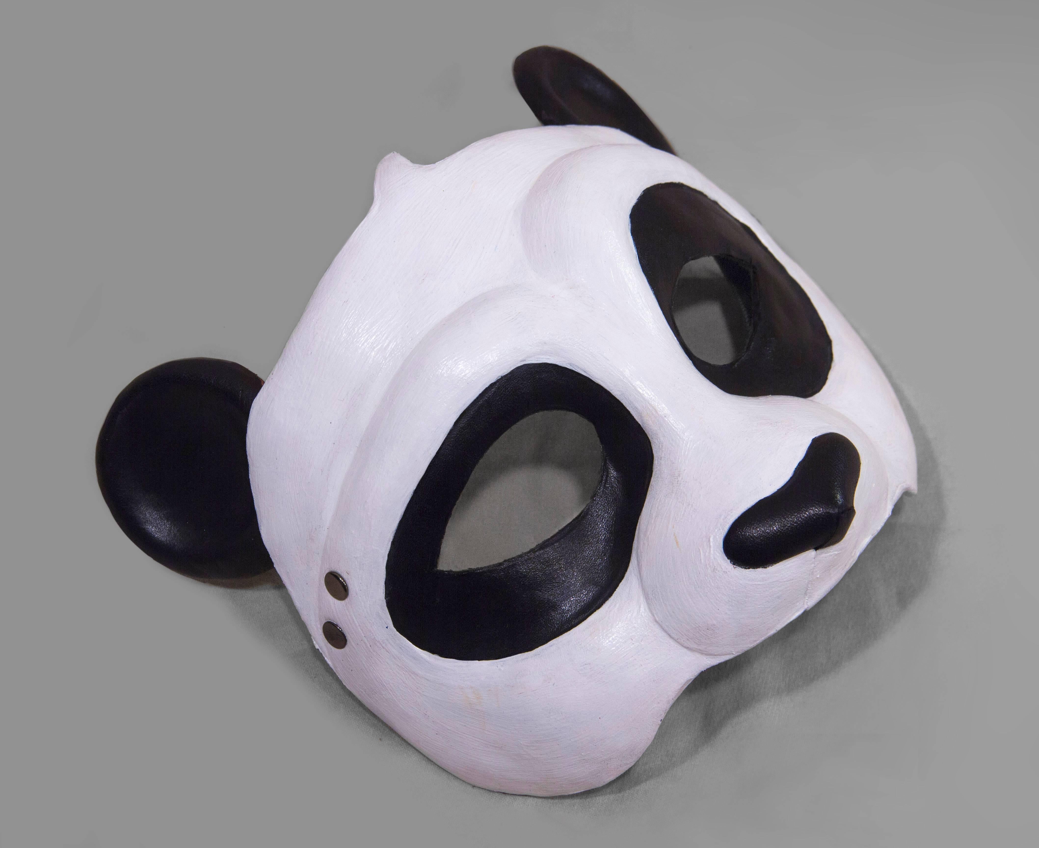 Inspired by the fanciful, playful panda. This piece is wearable art, making it perfect for a masquerade, costume party, Halloween, or as a beautiful shelf or wall piece. The frame of the mask is adjustable, so you may adjust it to the shape of your