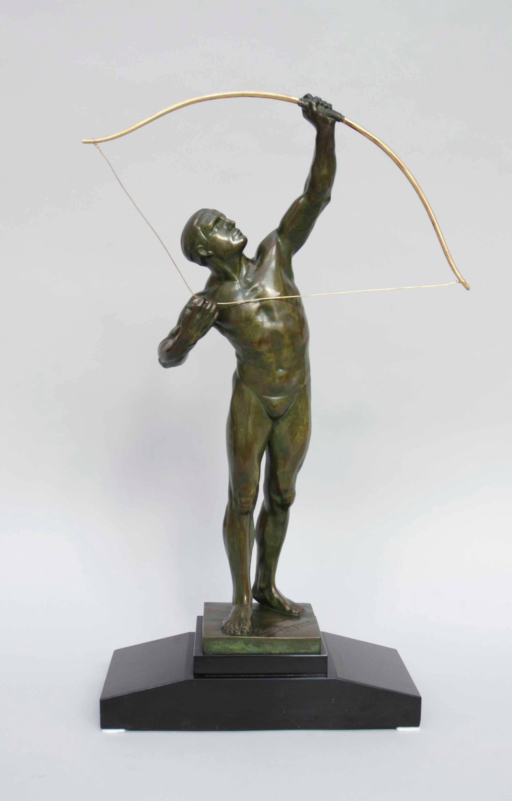 Beautiful Art Deco male archer. Brons with green sheen on black marble base.
Size: H 59cm with base, signed and dated 1932 on the terrasse.
Belgian School

Demanet studied fine art at the academy of Namur in Belgium before enrolling in the army.
