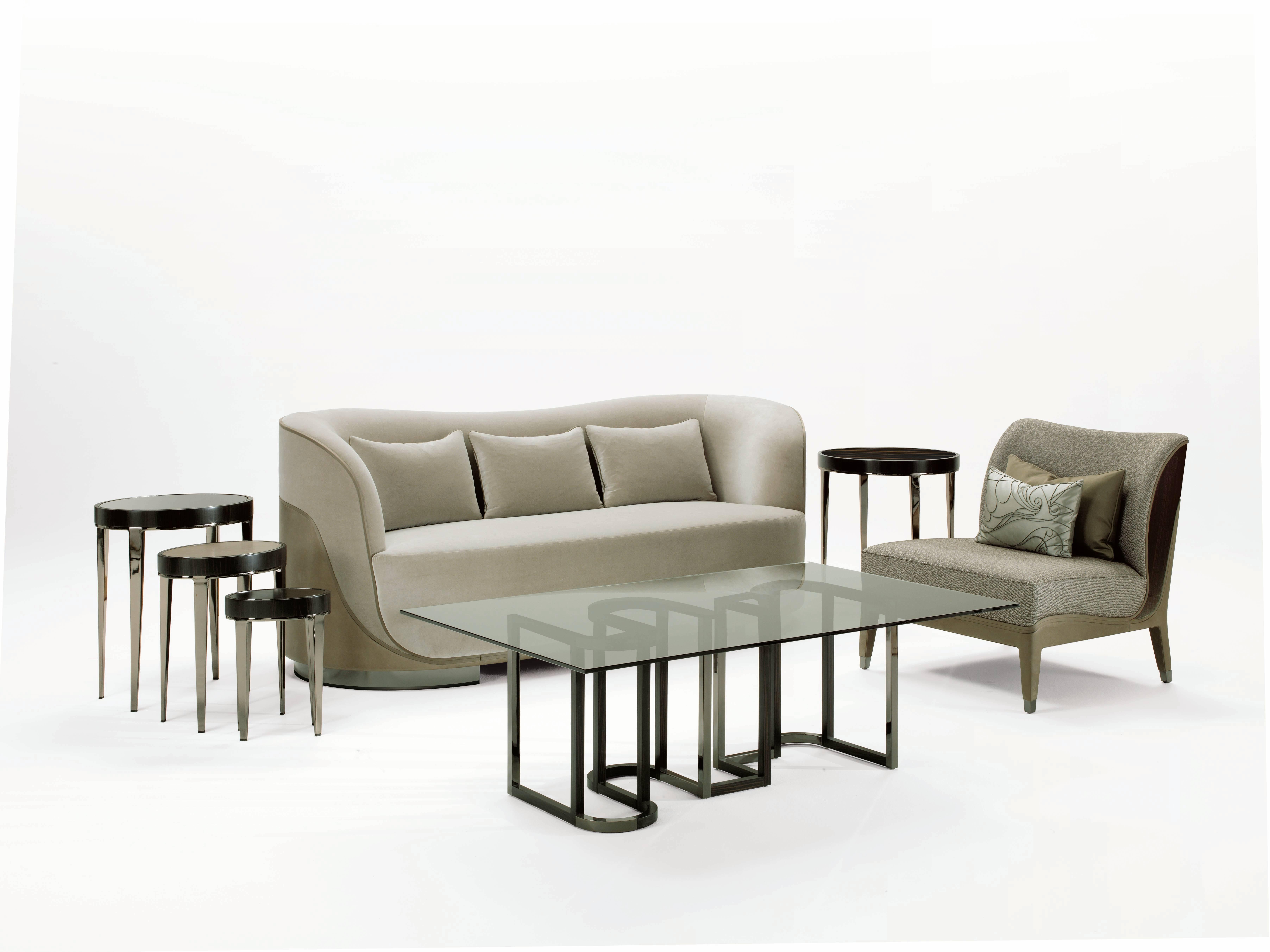 Upholstered in Rubelli 'Spritz' fabric range, color Argilla and in 'Breva' leather range, color creta with piping in Kieffer by Rubelli 'Gabardine' fabric range, color Bois.
Polished black nickel feet.

           